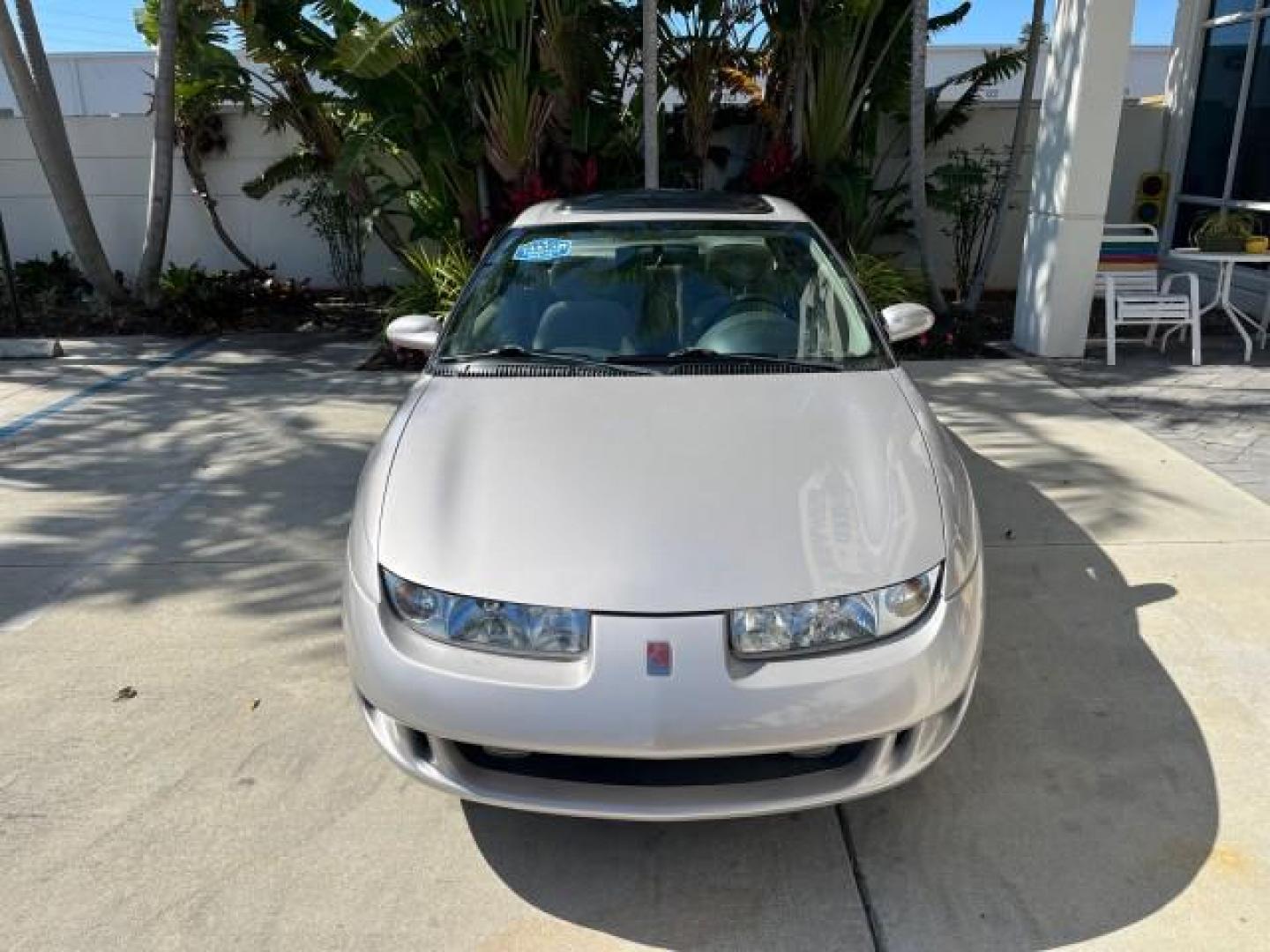 1999 Silver /Grey Saturn SC 3dr LOW MILES 53,616 (1G8ZY1276XZ) with an 1.9L DOHC SPFI 16-Valve L4 Aluminum Engine engine, Automatic transmission, located at 4701 North Dixie Hwy, Pompano Beach, FL, 33064, (954) 422-2889, 26.240938, -80.123474 - 1999 SATURN S-SERIES SC2 ROAD READY 1.9L L4 VIN: 1G8ZY1276XZ371017 NO RECALLS 36 MPG COUPE 3 DR LOW MILES 53,616 1.9L I4 F DOHC 16V 21 SERVICE RECORDS GASOLINE POWER SUNROOF FRONT WHEEL DRIVE POWER MIRRORS THIS IS ONE OF THE NICEST SATURN'S WE HAVE EVER LISTED RETIREE NORTH CAROLINA TITLE THIS IS TH - Photo#2