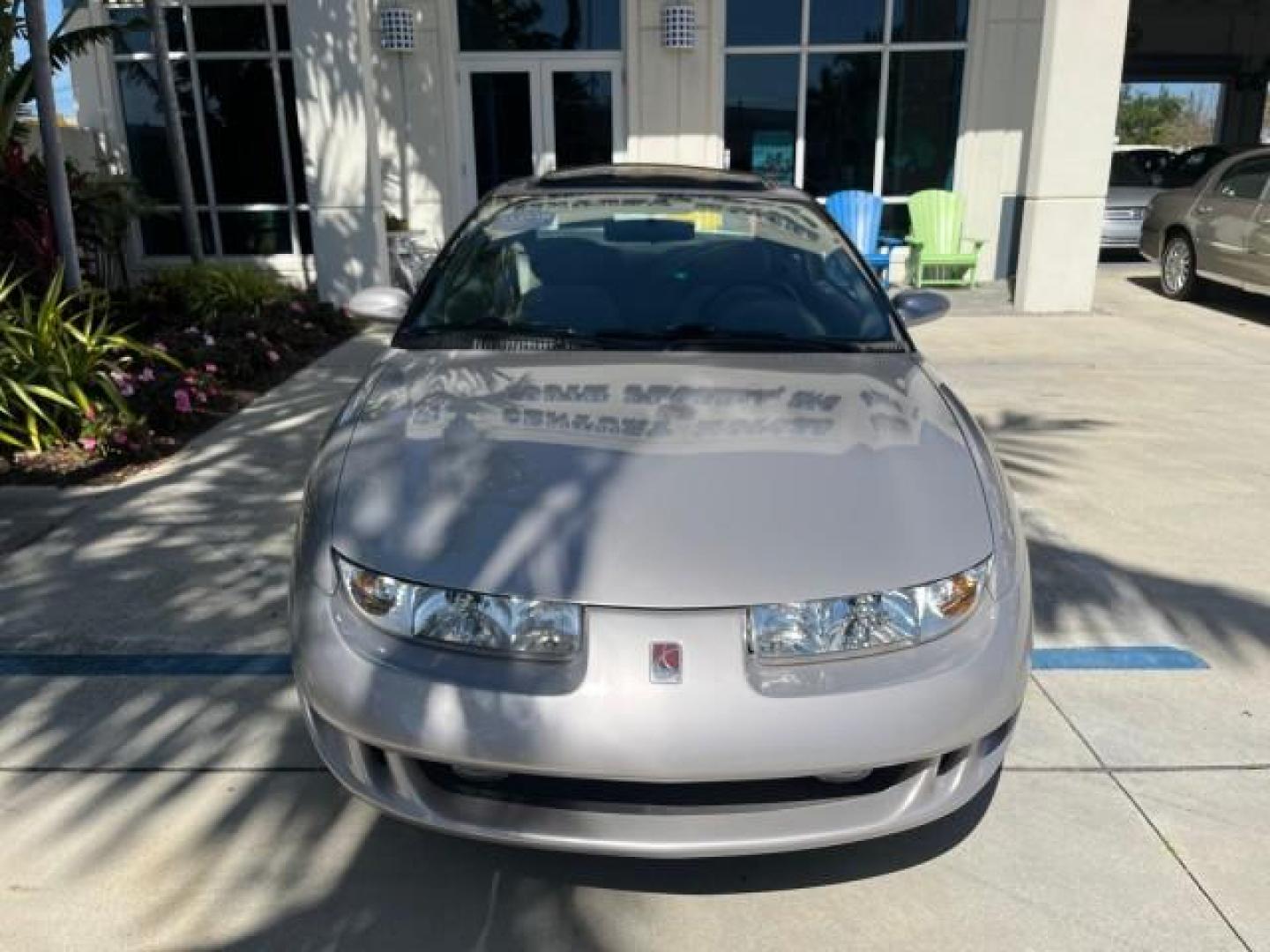 1999 Silver /Grey Saturn SC 3dr LOW MILES 53,616 (1G8ZY1276XZ) with an 1.9L DOHC SPFI 16-Valve L4 Aluminum Engine engine, Automatic transmission, located at 4701 North Dixie Hwy, Pompano Beach, FL, 33064, (954) 422-2889, 26.240938, -80.123474 - 1999 SATURN S-SERIES SC2 ROAD READY 1.9L L4 VIN: 1G8ZY1276XZ371017 NO RECALLS 36 MPG COUPE 3 DR LOW MILES 53,616 1.9L I4 F DOHC 16V 21 SERVICE RECORDS GASOLINE POWER SUNROOF FRONT WHEEL DRIVE POWER MIRRORS THIS IS ONE OF THE NICEST SATURN'S WE HAVE EVER LISTED RETIREE NORTH CAROLINA TITLE THIS IS TH - Photo#59