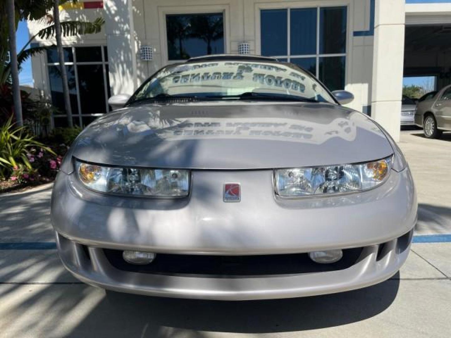 1999 Silver /Grey Saturn SC 3dr LOW MILES 53,616 (1G8ZY1276XZ) with an 1.9L DOHC SPFI 16-Valve L4 Aluminum Engine engine, Automatic transmission, located at 4701 North Dixie Hwy, Pompano Beach, FL, 33064, (954) 422-2889, 26.240938, -80.123474 - 1999 SATURN S-SERIES SC2 ROAD READY 1.9L L4 VIN: 1G8ZY1276XZ371017 NO RECALLS 36 MPG COUPE 3 DR LOW MILES 53,616 1.9L I4 F DOHC 16V 21 SERVICE RECORDS GASOLINE POWER SUNROOF FRONT WHEEL DRIVE POWER MIRRORS THIS IS ONE OF THE NICEST SATURN'S WE HAVE EVER LISTED RETIREE NORTH CAROLINA TITLE THIS IS TH - Photo#65