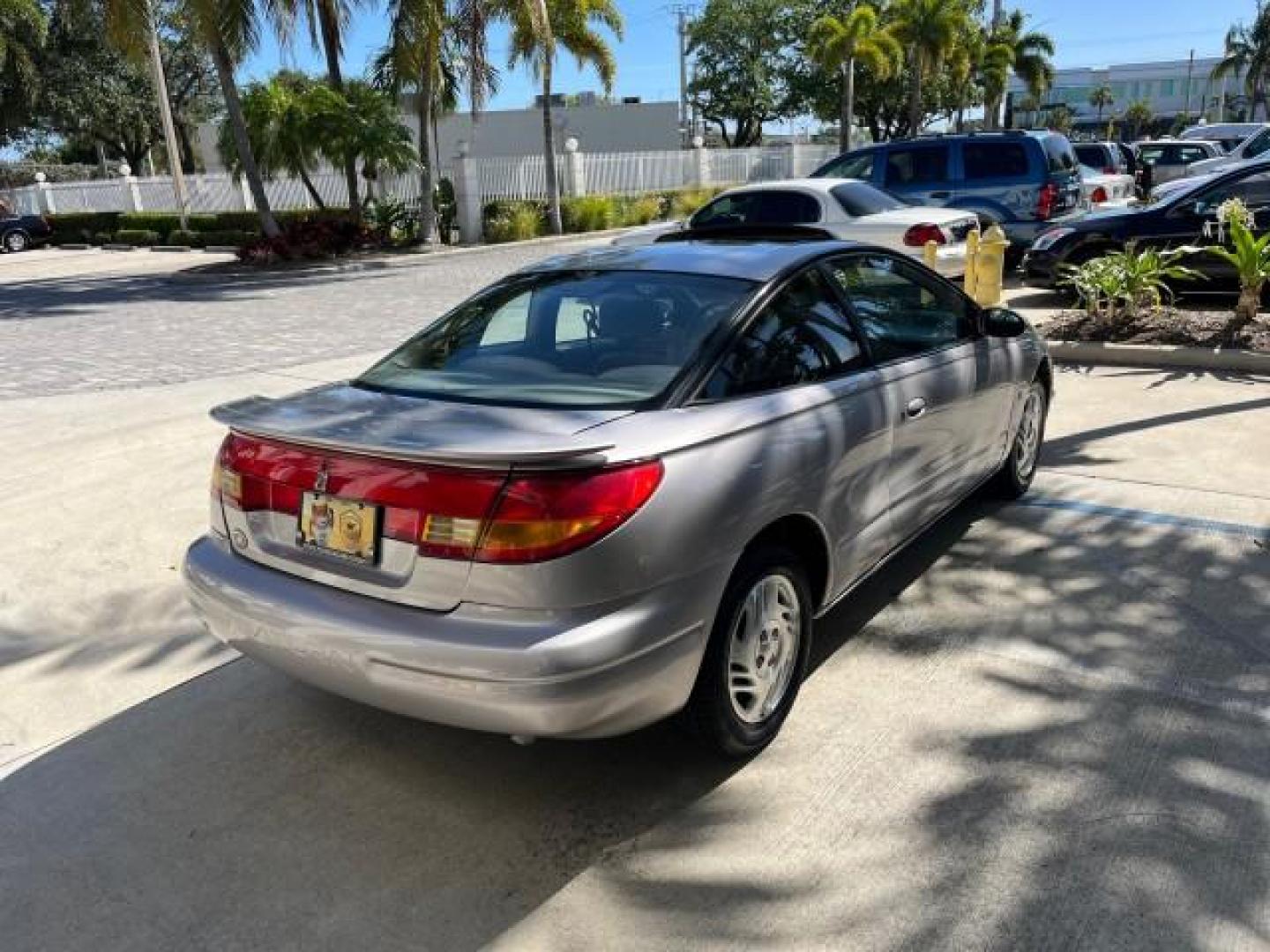 1999 Silver /Grey Saturn SC 3dr LOW MILES 53,616 (1G8ZY1276XZ) with an 1.9L DOHC SPFI 16-Valve L4 Aluminum Engine engine, Automatic transmission, located at 4701 North Dixie Hwy, Pompano Beach, FL, 33064, (954) 422-2889, 26.240938, -80.123474 - 1999 SATURN S-SERIES SC2 ROAD READY 1.9L L4 VIN: 1G8ZY1276XZ371017 NO RECALLS 36 MPG COUPE 3 DR LOW MILES 53,616 1.9L I4 F DOHC 16V 21 SERVICE RECORDS GASOLINE POWER SUNROOF FRONT WHEEL DRIVE POWER MIRRORS THIS IS ONE OF THE NICEST SATURN'S WE HAVE EVER LISTED RETIREE NORTH CAROLINA TITLE THIS IS TH - Photo#6