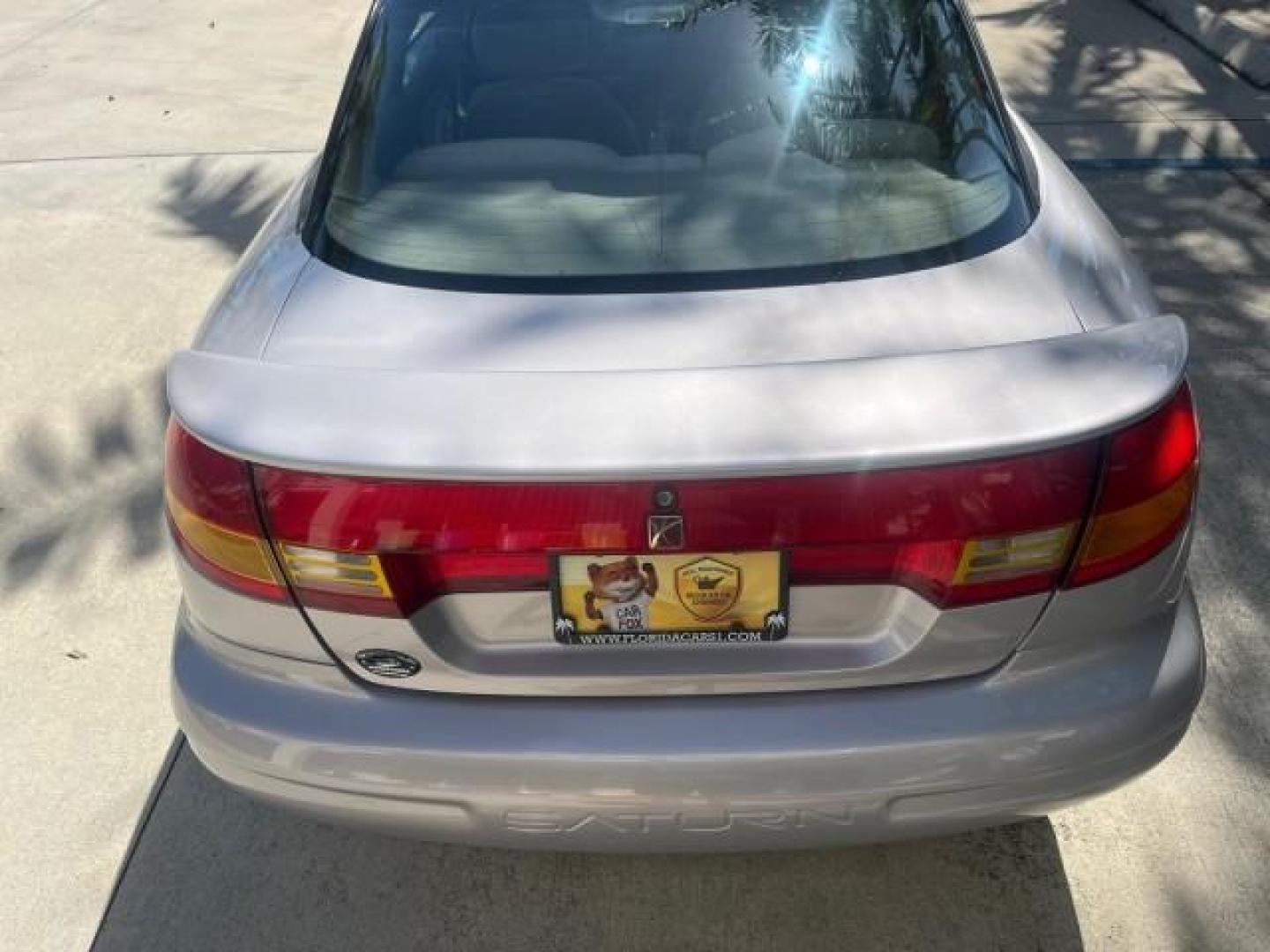 1999 Silver /Grey Saturn SC 3dr LOW MILES 53,616 (1G8ZY1276XZ) with an 1.9L DOHC SPFI 16-Valve L4 Aluminum Engine engine, Automatic transmission, located at 4701 North Dixie Hwy, Pompano Beach, FL, 33064, (954) 422-2889, 26.240938, -80.123474 - 1999 SATURN S-SERIES SC2 ROAD READY 1.9L L4 VIN: 1G8ZY1276XZ371017 NO RECALLS 36 MPG COUPE 3 DR LOW MILES 53,616 1.9L I4 F DOHC 16V 21 SERVICE RECORDS GASOLINE POWER SUNROOF FRONT WHEEL DRIVE POWER MIRRORS THIS IS ONE OF THE NICEST SATURN'S WE HAVE EVER LISTED RETIREE NORTH CAROLINA TITLE THIS IS TH - Photo#86