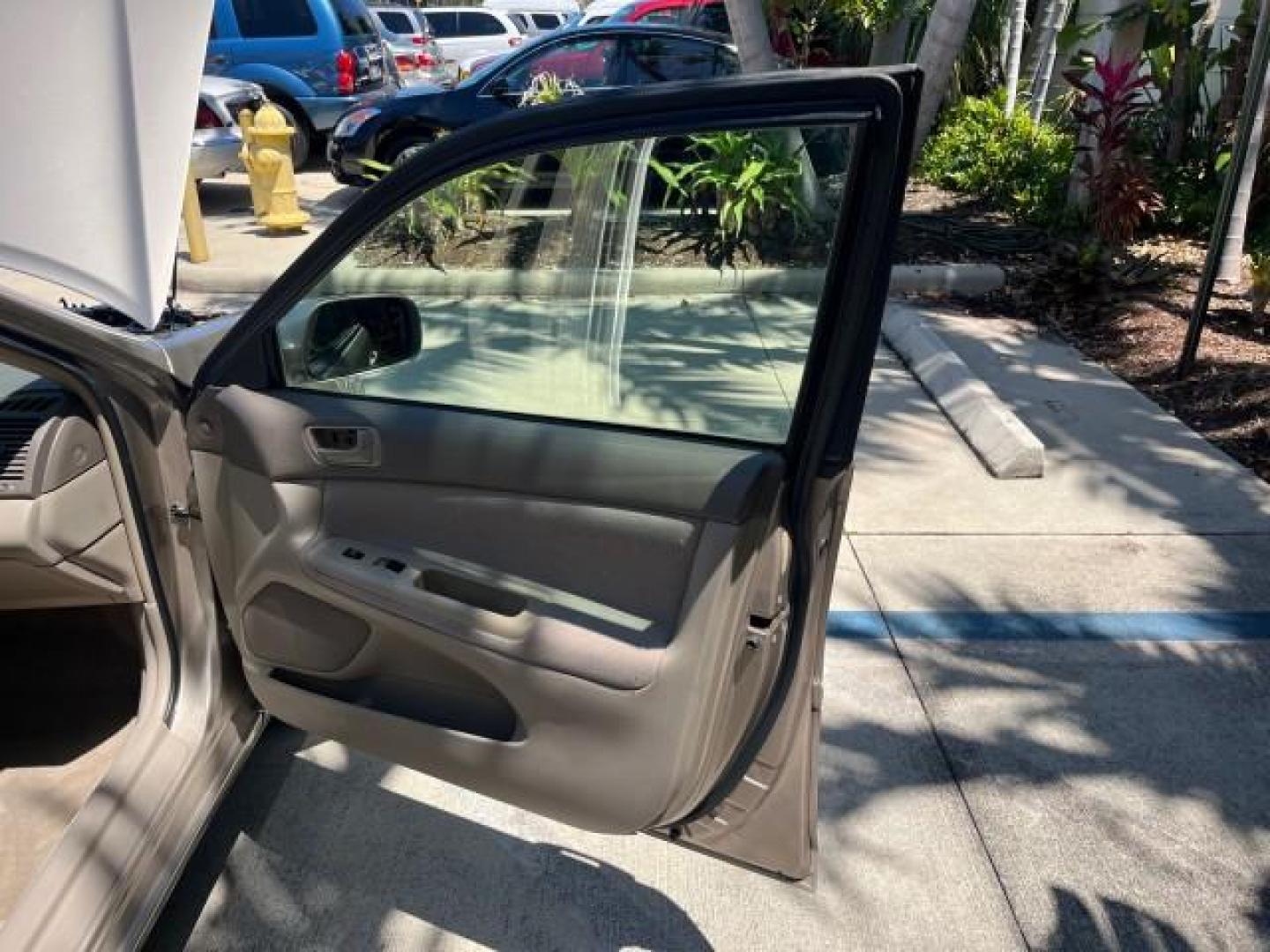 2003 Desert Sand Mica /Stone Toyota Camry 1 FL LE LOW MILES 72,716 (4T1BE32K03U) with an 2.4L DOHC Vvti 16-Valve 4-Cyl Engine engine, Automatic transmission, located at 4701 North Dixie Hwy, Pompano Beach, FL, 33064, (954) 422-2889, 26.240938, -80.123474 - 2003 TOYOTA CAMRY LE ROAD READY 2.4L I4 VIN: 4T1BE32K03U208527 NO RECALLS 32 MPG SEDAN 4 DR 1 OWNER FLORIDA 2.4L I4 F DOHC 16V LOW MILES 72,716 GASOLINE 24 SERVICE RECORDS FRONT WHEEL DRIVE POWER SEATS/MIRRORS Approach Lights Cruise Control FWD Front Bucket Seats THIS IS ONE OF THE NICEST CAMRYS WE - Photo#11