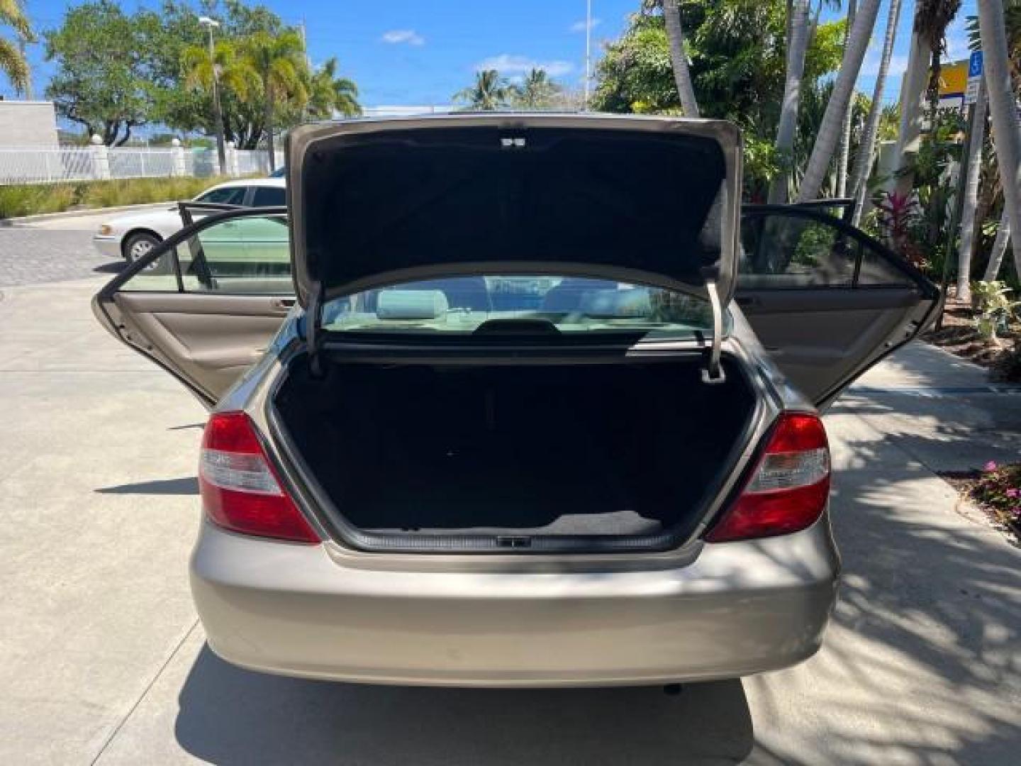 2003 Desert Sand Mica /Stone Toyota Camry 1 FL LE LOW MILES 72,716 (4T1BE32K03U) with an 2.4L DOHC Vvti 16-Valve 4-Cyl Engine engine, Automatic transmission, located at 4701 North Dixie Hwy, Pompano Beach, FL, 33064, (954) 422-2889, 26.240938, -80.123474 - 2003 TOYOTA CAMRY LE ROAD READY 2.4L I4 VIN: 4T1BE32K03U208527 NO RECALLS 32 MPG SEDAN 4 DR 1 OWNER FLORIDA 2.4L I4 F DOHC 16V LOW MILES 72,716 GASOLINE 24 SERVICE RECORDS FRONT WHEEL DRIVE POWER SEATS/MIRRORS Approach Lights Cruise Control FWD Front Bucket Seats THIS IS ONE OF THE NICEST CAMRYS WE - Photo#15