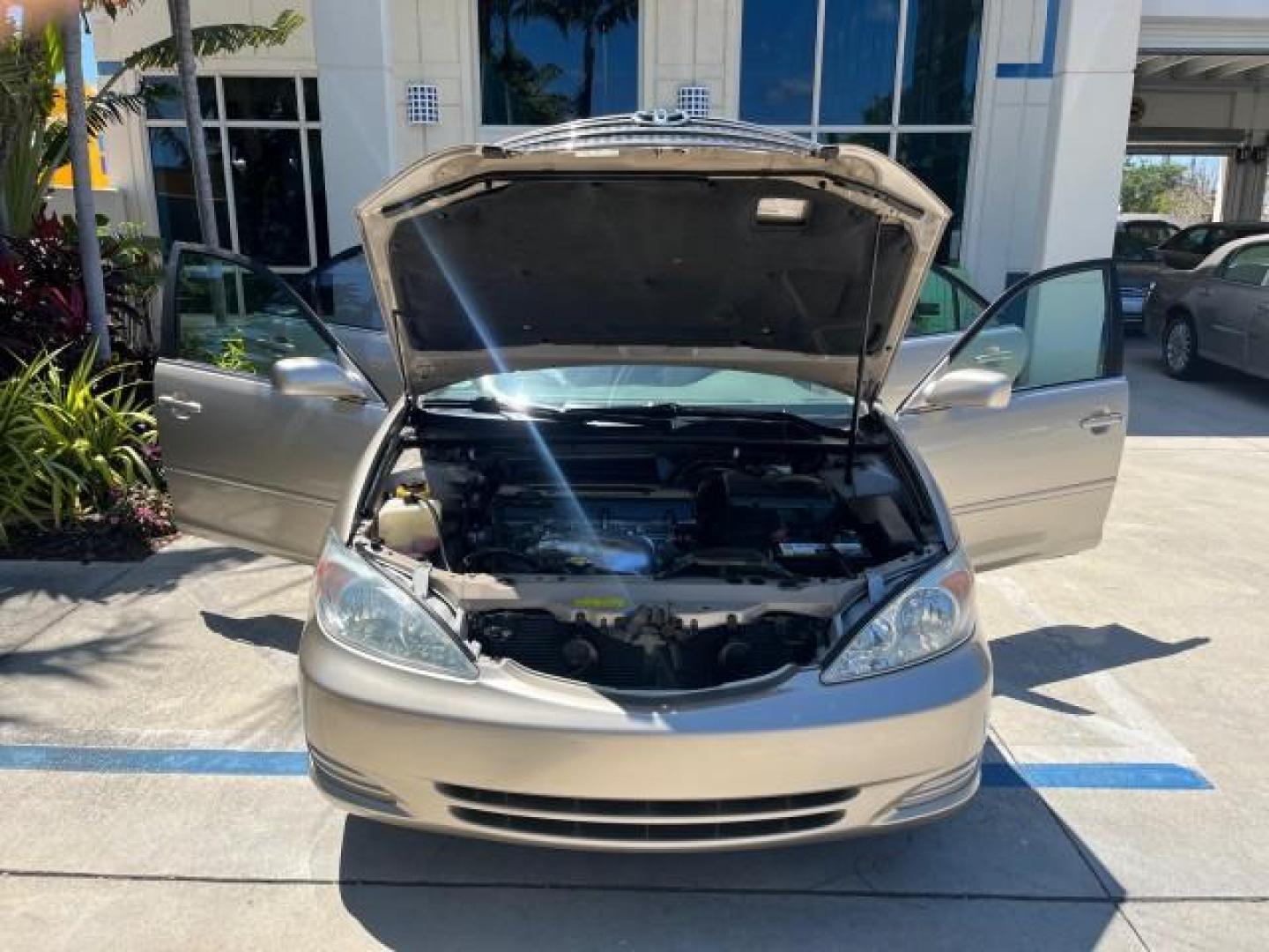 2003 Desert Sand Mica /Stone Toyota Camry 1 FL LE LOW MILES 72,716 (4T1BE32K03U) with an 2.4L DOHC Vvti 16-Valve 4-Cyl Engine engine, Automatic transmission, located at 4701 North Dixie Hwy, Pompano Beach, FL, 33064, (954) 422-2889, 26.240938, -80.123474 - 2003 TOYOTA CAMRY LE ROAD READY 2.4L I4 VIN: 4T1BE32K03U208527 NO RECALLS 32 MPG SEDAN 4 DR 1 OWNER FLORIDA 2.4L I4 F DOHC 16V LOW MILES 72,716 GASOLINE 24 SERVICE RECORDS FRONT WHEEL DRIVE POWER SEATS/MIRRORS Approach Lights Cruise Control FWD Front Bucket Seats THIS IS ONE OF THE NICEST CAMRYS WE - Photo#16