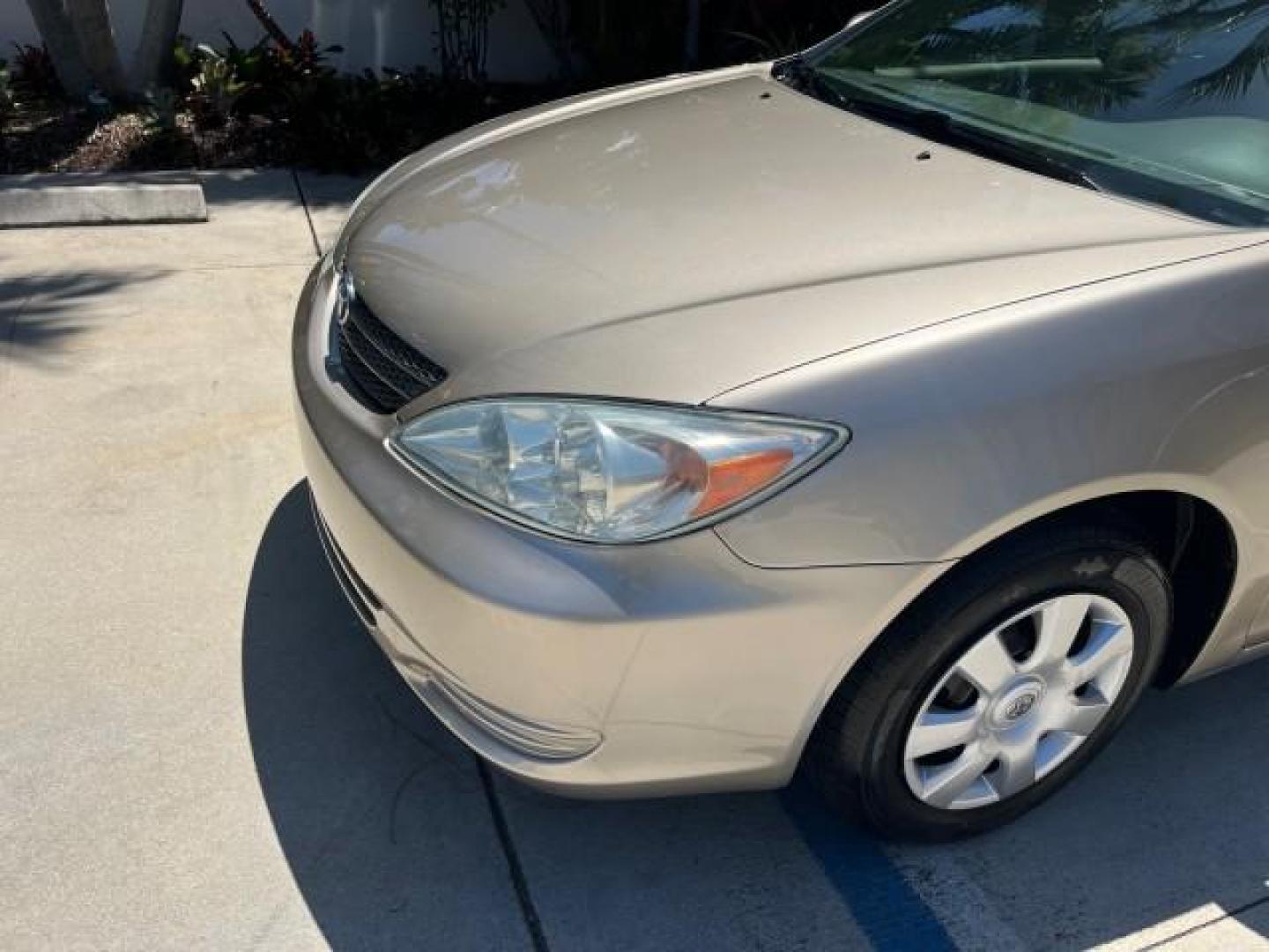 2003 Desert Sand Mica /Stone Toyota Camry 1 FL LE LOW MILES 72,716 (4T1BE32K03U) with an 2.4L DOHC Vvti 16-Valve 4-Cyl Engine engine, Automatic transmission, located at 4701 North Dixie Hwy, Pompano Beach, FL, 33064, (954) 422-2889, 26.240938, -80.123474 - 2003 TOYOTA CAMRY LE ROAD READY 2.4L I4 VIN: 4T1BE32K03U208527 NO RECALLS 32 MPG SEDAN 4 DR 1 OWNER FLORIDA 2.4L I4 F DOHC 16V LOW MILES 72,716 GASOLINE 24 SERVICE RECORDS FRONT WHEEL DRIVE POWER SEATS/MIRRORS Approach Lights Cruise Control FWD Front Bucket Seats THIS IS ONE OF THE NICEST CAMRYS WE - Photo#81