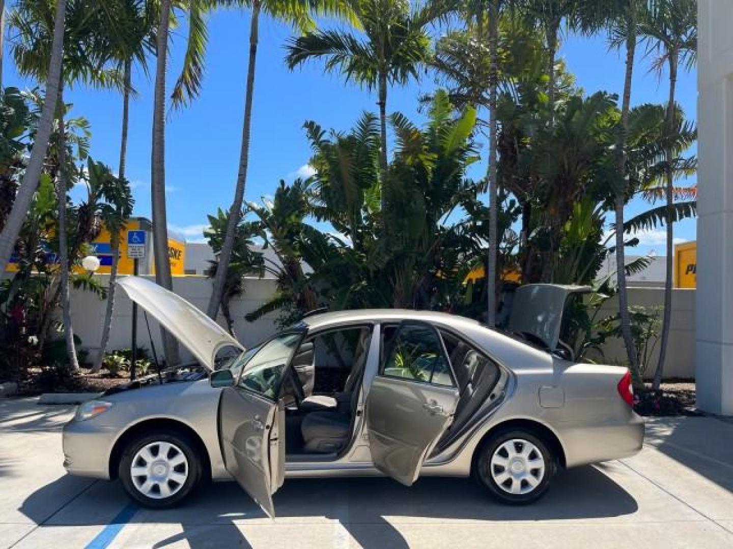 2003 Desert Sand Mica /Stone Toyota Camry 1 FL LE LOW MILES 72,716 (4T1BE32K03U) with an 2.4L DOHC Vvti 16-Valve 4-Cyl Engine engine, Automatic transmission, located at 4701 North Dixie Hwy, Pompano Beach, FL, 33064, (954) 422-2889, 26.240938, -80.123474 - 2003 TOYOTA CAMRY LE ROAD READY 2.4L I4 VIN: 4T1BE32K03U208527 NO RECALLS 32 MPG SEDAN 4 DR 1 OWNER FLORIDA 2.4L I4 F DOHC 16V LOW MILES 72,716 GASOLINE 24 SERVICE RECORDS FRONT WHEEL DRIVE POWER SEATS/MIRRORS Approach Lights Cruise Control FWD Front Bucket Seats THIS IS ONE OF THE NICEST CAMRYS WE - Photo#8