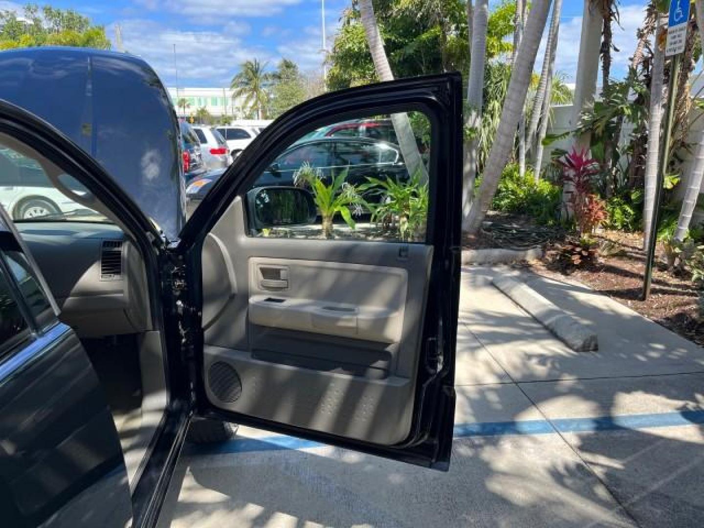 2005 Black /Khaki Dodge Dakota SLT LOW MILES 59,997 4 DR (1D7HE42N35S) with an 4.7L V8 Magnum Engine engine, Automatic transmission, located at 4701 North Dixie Hwy, Pompano Beach, FL, 33064, (954) 422-2889, 26.240938, -80.123474 - 2005 DODGE DAKOTA SLT ROAD READY 4.7L V8 VIN: 1D7HE42N35S122373 FLORIDA OWNER CLUB CAB PICKUP LOW MILES 59,997 4.7L V8 F NO ACCIDENTS GASOLINE 12 SERVICE RECORDS REAR WHEEL DRIVE 6.6FT BED POWER SEATS 6.6' Bed Length Alloy Wheels Automatic Climate Control Cruise Control Fog Lights RWD THIS IS ONE OF - Photo#11