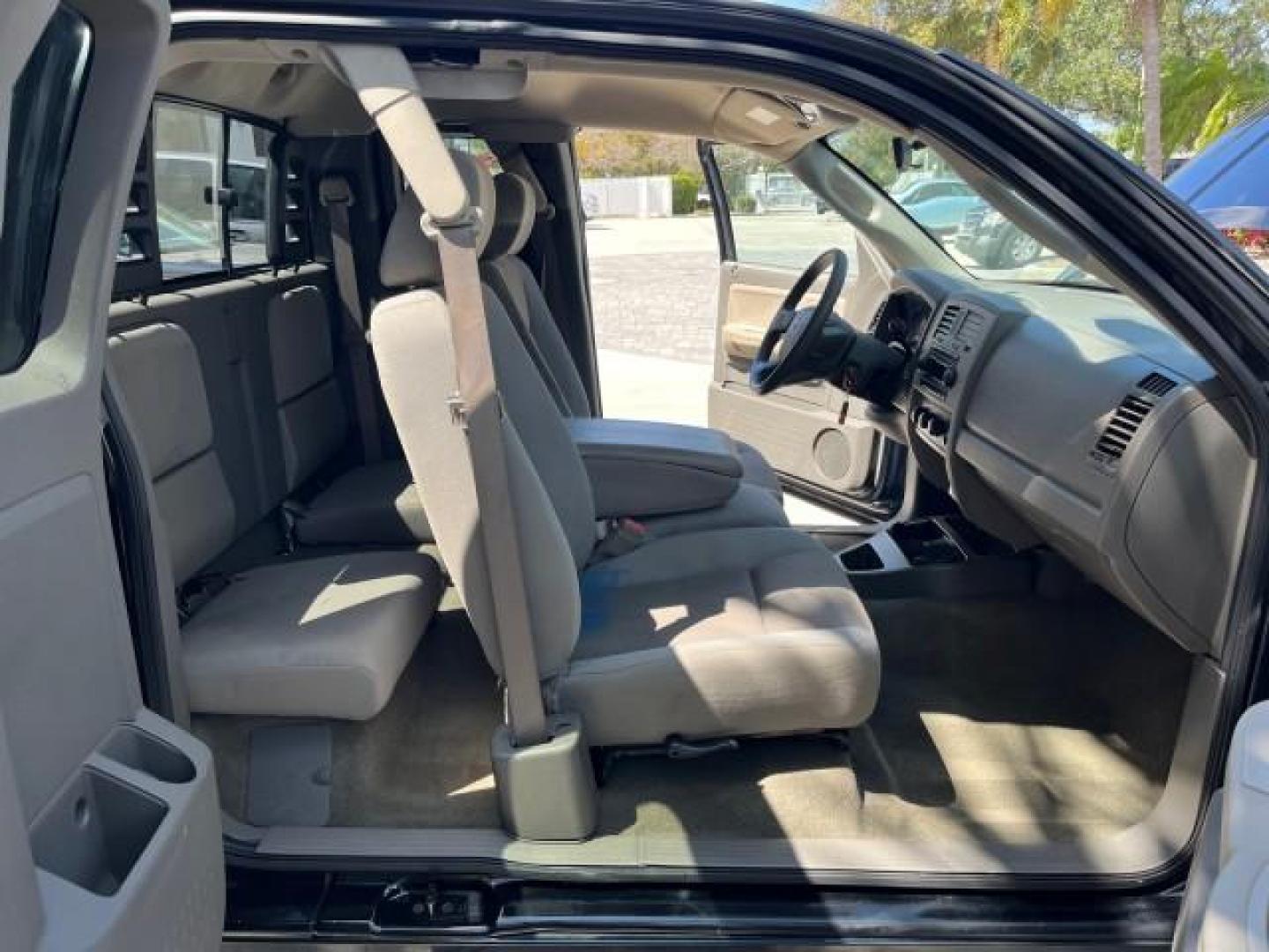 2005 Black /Khaki Dodge Dakota SLT LOW MILES 59,997 4 DR (1D7HE42N35S) with an 4.7L V8 Magnum Engine engine, Automatic transmission, located at 4701 North Dixie Hwy, Pompano Beach, FL, 33064, (954) 422-2889, 26.240938, -80.123474 - 2005 DODGE DAKOTA SLT ROAD READY 4.7L V8 VIN: 1D7HE42N35S122373 FLORIDA OWNER CLUB CAB PICKUP LOW MILES 59,997 4.7L V8 F NO ACCIDENTS GASOLINE 12 SERVICE RECORDS REAR WHEEL DRIVE 6.6FT BED POWER SEATS 6.6' Bed Length Alloy Wheels Automatic Climate Control Cruise Control Fog Lights RWD THIS IS ONE OF - Photo#13