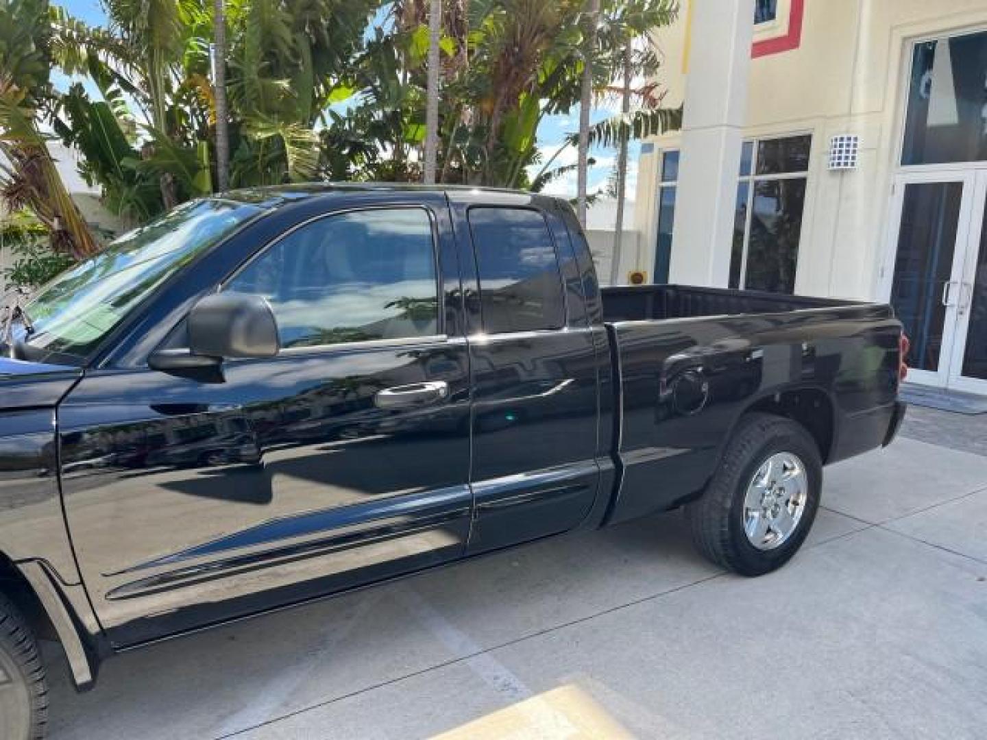 2005 Black /Khaki Dodge Dakota SLT LOW MILES 59,997 4 DR (1D7HE42N35S) with an 4.7L V8 Magnum Engine engine, Automatic transmission, located at 4701 North Dixie Hwy, Pompano Beach, FL, 33064, (954) 422-2889, 26.240938, -80.123474 - 2005 DODGE DAKOTA SLT ROAD READY 4.7L V8 VIN: 1D7HE42N35S122373 FLORIDA OWNER CLUB CAB PICKUP LOW MILES 59,997 4.7L V8 F NO ACCIDENTS GASOLINE 12 SERVICE RECORDS REAR WHEEL DRIVE 6.6FT BED POWER SEATS 6.6' Bed Length Alloy Wheels Automatic Climate Control Cruise Control Fog Lights RWD THIS IS ONE OF - Photo#69