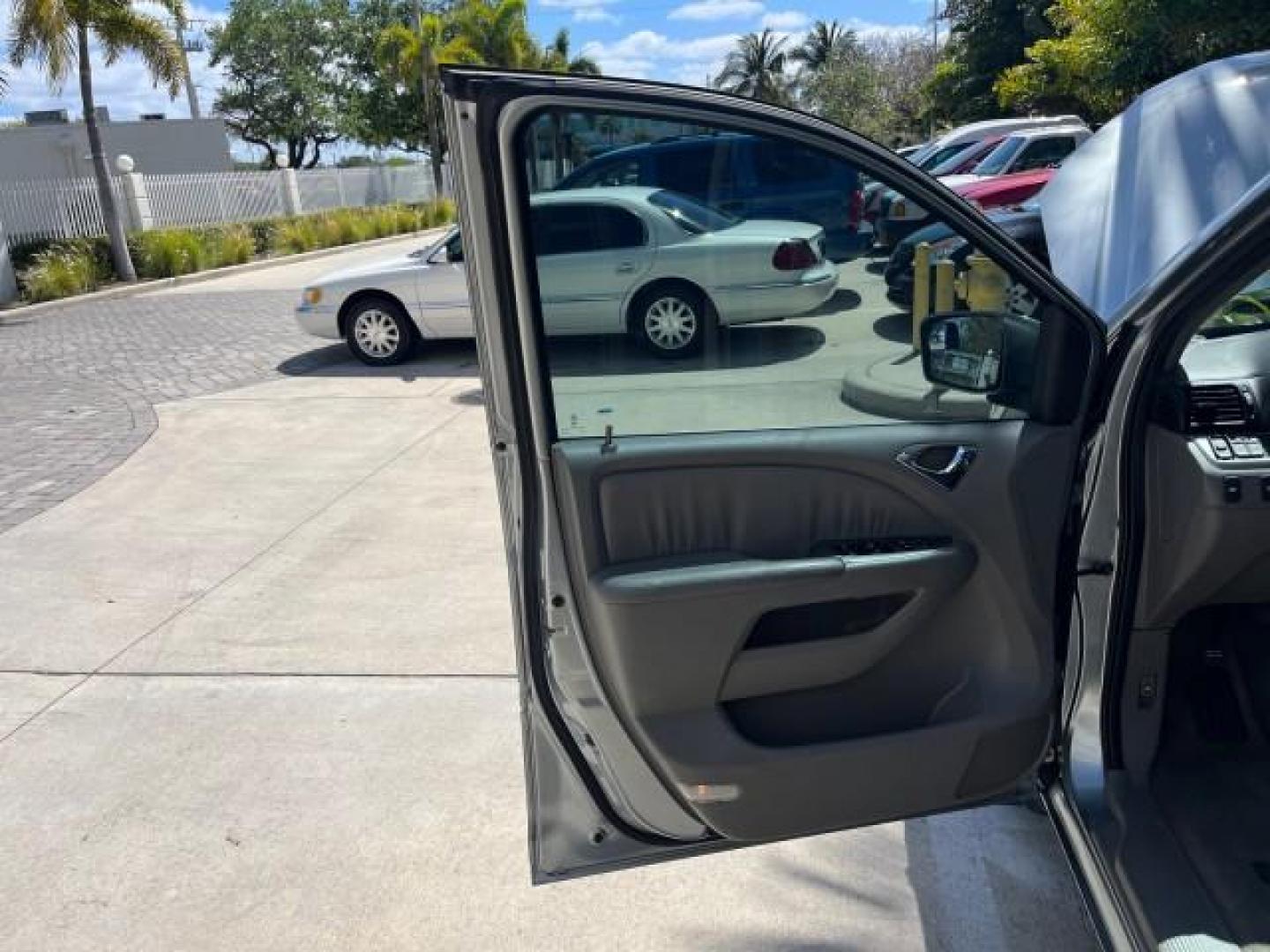 2010 Slate Green Metallic /Gray Honda Odyssey 1 FL EX-L LOW MILES 70,545 (5FNRL3H62AB) with an 3.5L SOHC MPFI 24-Valve i-VTEC V6 Engine engine, Automatic transmission, located at 4701 North Dixie Hwy, Pompano Beach, FL, 33064, (954) 422-2889, 26.240938, -80.123474 - 2010 HONDA ODYSSEY EX-L ROAD READY 3.5L V6 VIN: 5FNRL3H62AB044366 LOW MILES 70,545 NO RECALLS SUNROOF VAN BACK UP CAMERA POWER LEATHER SEATS 3.5L V6 F SOHC 24V 3 ROW LEATHER SEATS POWER SLIDING DOORS GASOLINE DUAL ZONE AC POWER LIFTGATE/MIRRORS FRONT WHEEL DRIVE 34 SERVICE RECORDS 1 OWNER FLORIDA Ac - Photo#9