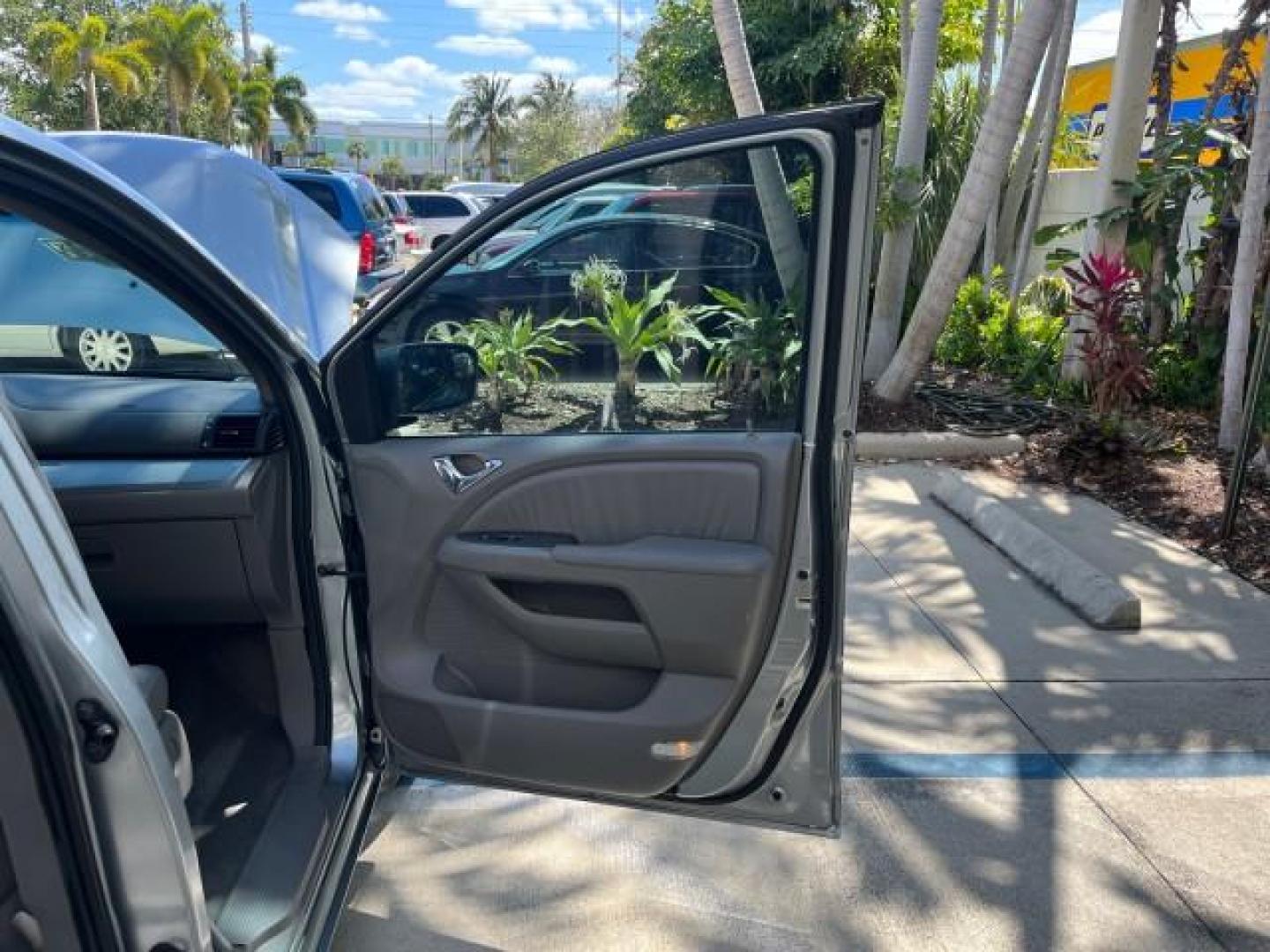 2010 Slate Green Metallic /Gray Honda Odyssey 1 FL EX-L LOW MILES 70,545 (5FNRL3H62AB) with an 3.5L SOHC MPFI 24-Valve i-VTEC V6 Engine engine, Automatic transmission, located at 4701 North Dixie Hwy, Pompano Beach, FL, 33064, (954) 422-2889, 26.240938, -80.123474 - 2010 HONDA ODYSSEY EX-L ROAD READY 3.5L V6 VIN: 5FNRL3H62AB044366 LOW MILES 70,545 NO RECALLS SUNROOF VAN BACK UP CAMERA POWER LEATHER SEATS 3.5L V6 F SOHC 24V 3 ROW LEATHER SEATS POWER SLIDING DOORS GASOLINE DUAL ZONE AC POWER LIFTGATE/MIRRORS FRONT WHEEL DRIVE 34 SERVICE RECORDS 1 OWNER FLORIDA Ac - Photo#11