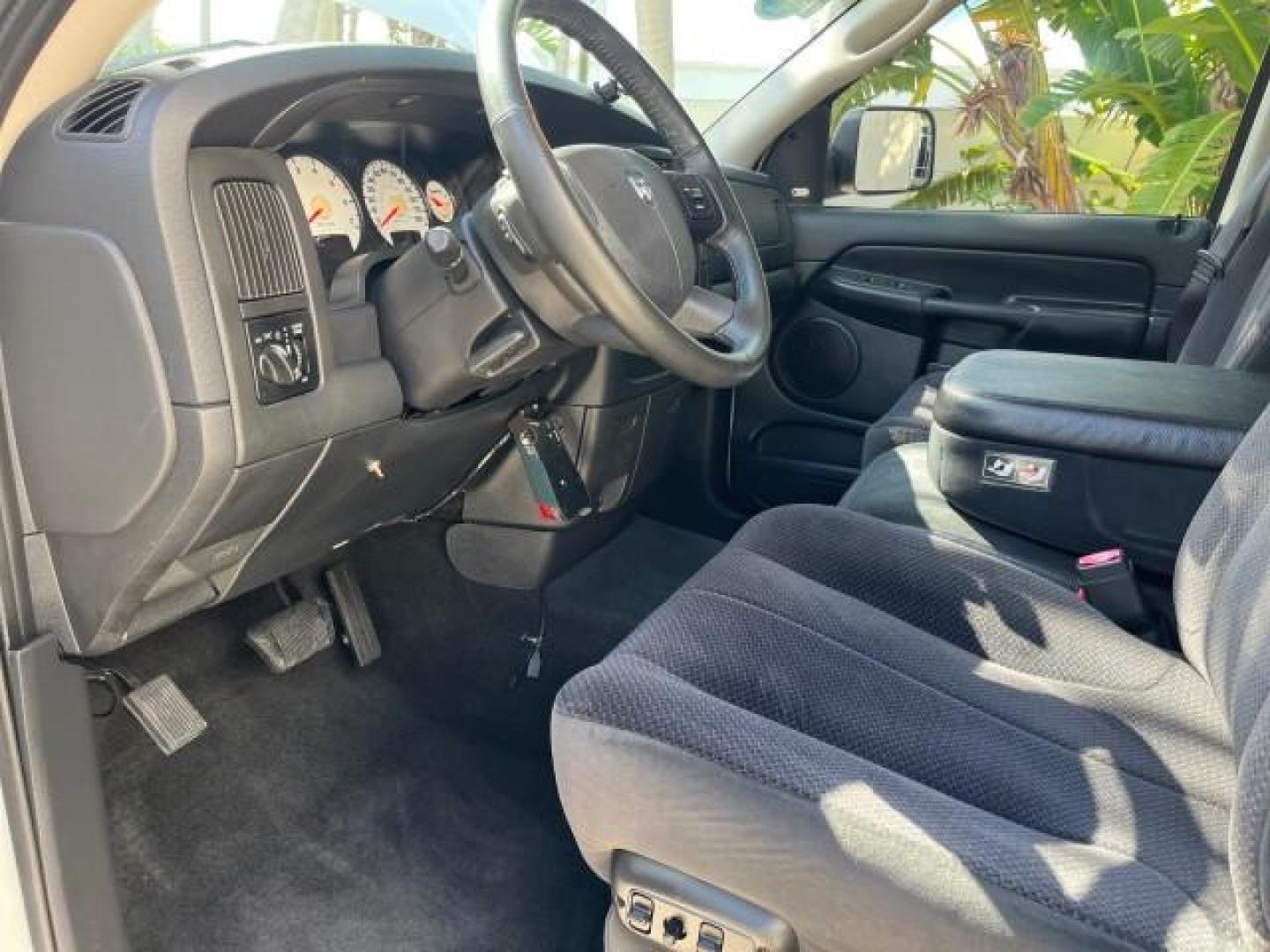 2004 Bright White /Dark Slate Gray Dodge Ram 1500 4 DR SLT V 8 LOW MILES (1D7HA18N44S) with an 4.7L V8 Magnum Engine engine, Automatic transmission, located at 4701 North Dixie Hwy, Pompano Beach, FL, 33064, (954) 422-2889, 26.240938, -80.123474 - OUR WEBPAGE FLORIDACARS1.COM HAS OVER 100 PHOTOS AND FREE CARFAX LINK 2004 DODGE RAM 1500 SLT ROAD READY 4.7L V8 VIN: 1D7HA18N44S753651 1 OWNER FLORIDA 4 DOOR EXTENDED CAB PICKUP LOW MILES 75,330 4.7L V8 F NO ACCIDENTS NO RECALLS GASOLINE POWER SEATS/MIRRORS REAR WHEEL DRIVE 6.4FT BED 18 SERVICE REC - Photo#37