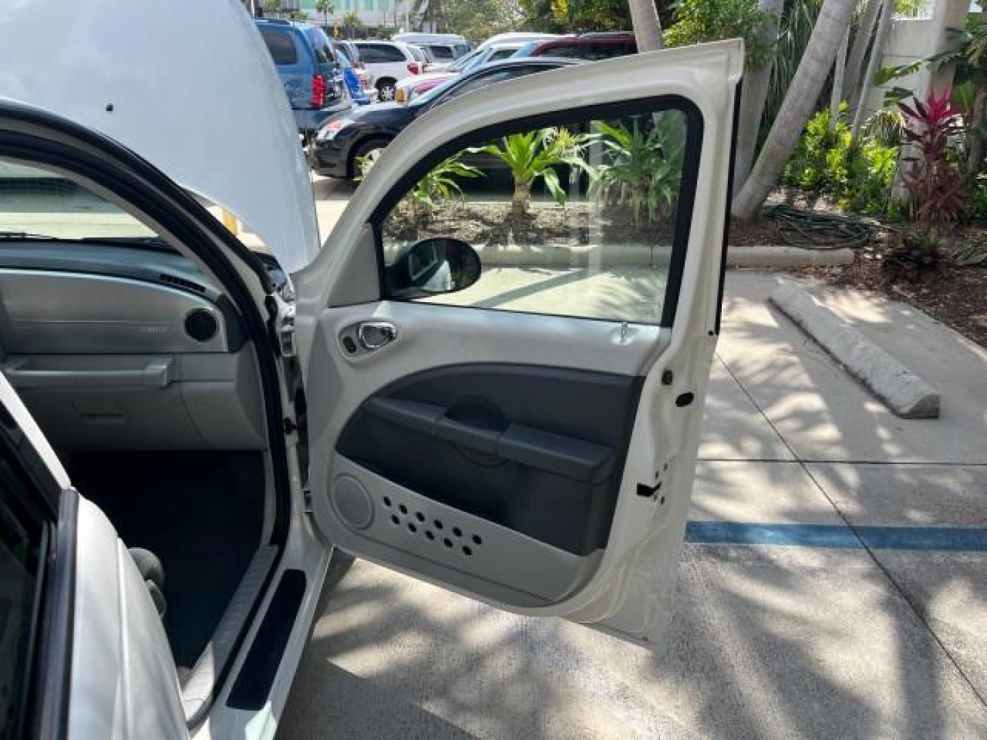 2010 Stone White /Pastel slate gray Chrysler PT Cruiser Classic LOW MILES 31,863 (3A4GY5F95AT) with an 2.4L DOHC SMPI 16-Valve I4 Engine engine, Automatic transmission, located at 4701 North Dixie Hwy, Pompano Beach, FL, 33064, (954) 422-2889, 26.240938, -80.123474 - 2010 CHRYSLER PT CRUISER ROAD READY 2.4L I4 VIN: 3A4GY5F95AT192153 NO ACCIDENTS NO RECALLS VAN FLORIDA OWNER 2.4L I4 F DOHC 16V 16 SERVICE RECORDS GASOLINE LOW MILES 31,863 FRONT WHEEL DRIVE Additional Airbags Alloy Wheels Anti-Theft System Chrome Grille Cruise Control Curtain Airbags Electronic Tra - Photo#11