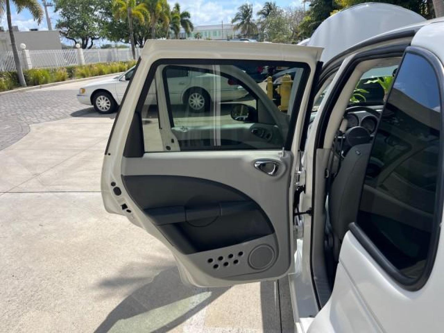 2010 Stone White /Pastel slate gray Chrysler PT Cruiser Classic LOW MILES 31,863 (3A4GY5F95AT) with an 2.4L DOHC SMPI 16-Valve I4 Engine engine, Automatic transmission, located at 4701 North Dixie Hwy, Pompano Beach, FL, 33064, (954) 422-2889, 26.240938, -80.123474 - 2010 CHRYSLER PT CRUISER ROAD READY 2.4L I4 VIN: 3A4GY5F95AT192153 NO ACCIDENTS NO RECALLS VAN FLORIDA OWNER 2.4L I4 F DOHC 16V 16 SERVICE RECORDS GASOLINE LOW MILES 31,863 FRONT WHEEL DRIVE Additional Airbags Alloy Wheels Anti-Theft System Chrome Grille Cruise Control Curtain Airbags Electronic Tra - Photo#13