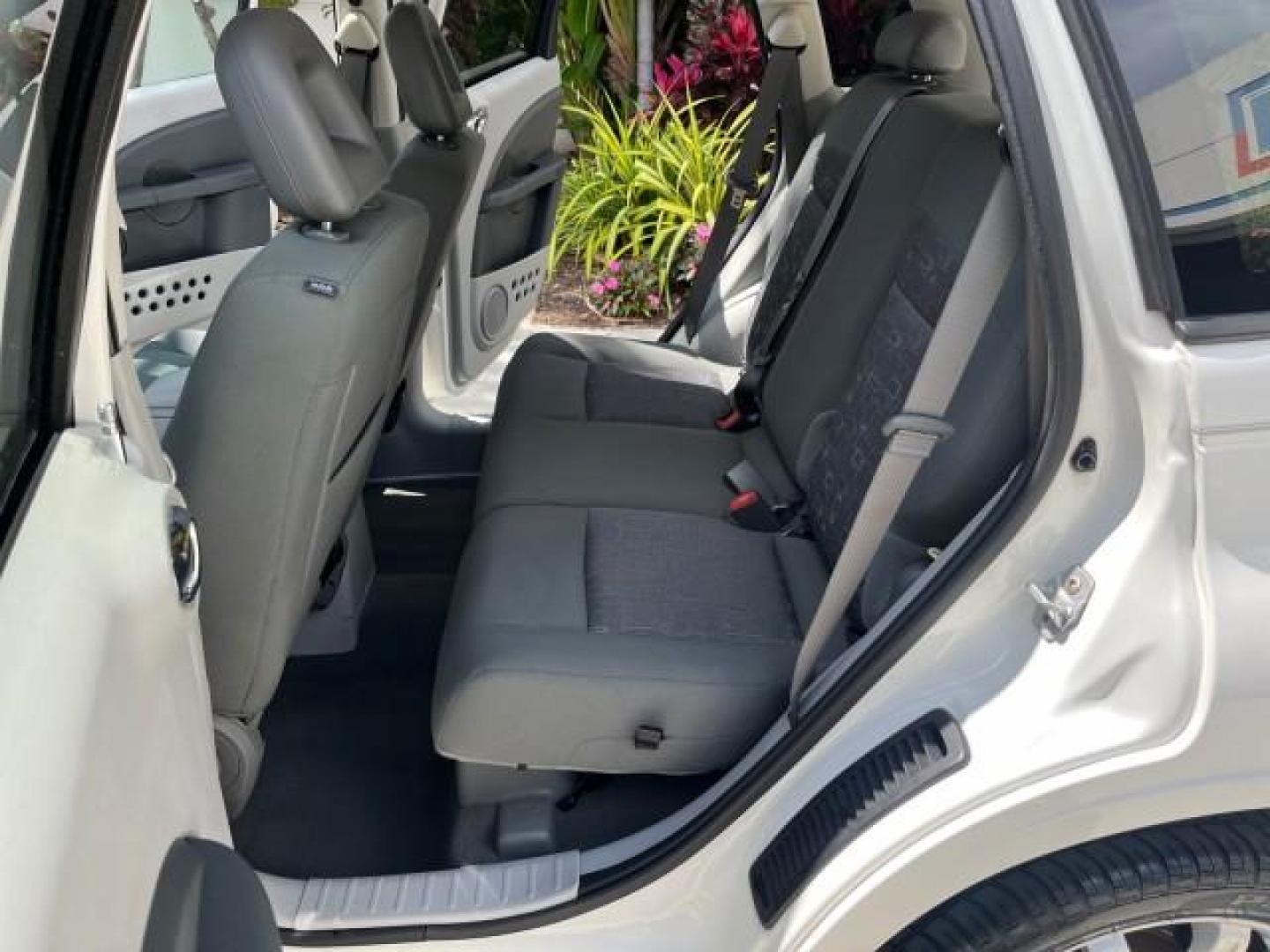 2010 Stone White /Pastel slate gray Chrysler PT Cruiser Classic LOW MILES 31,863 (3A4GY5F95AT) with an 2.4L DOHC SMPI 16-Valve I4 Engine engine, Automatic transmission, located at 4701 North Dixie Hwy, Pompano Beach, FL, 33064, (954) 422-2889, 26.240938, -80.123474 - 2010 CHRYSLER PT CRUISER ROAD READY 2.4L I4 VIN: 3A4GY5F95AT192153 NO ACCIDENTS NO RECALLS VAN FLORIDA OWNER 2.4L I4 F DOHC 16V 16 SERVICE RECORDS GASOLINE LOW MILES 31,863 FRONT WHEEL DRIVE Additional Airbags Alloy Wheels Anti-Theft System Chrome Grille Cruise Control Curtain Airbags Electronic Tra - Photo#14