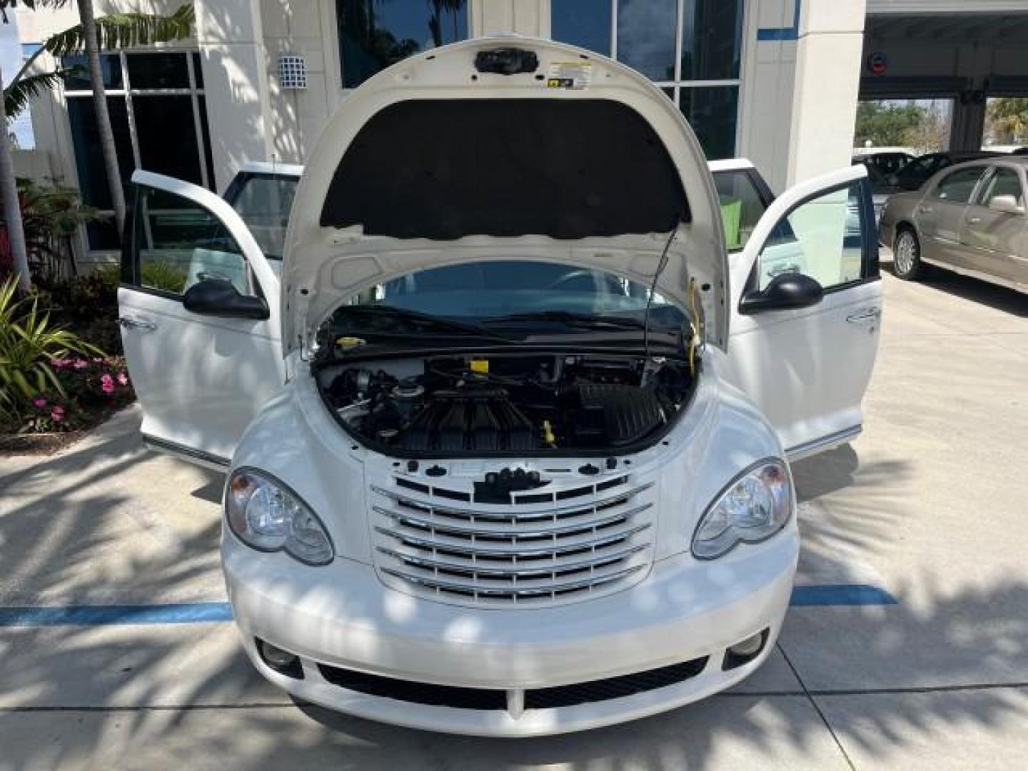 2010 Stone White /Pastel slate gray Chrysler PT Cruiser Classic LOW MILES 31,863 (3A4GY5F95AT) with an 2.4L DOHC SMPI 16-Valve I4 Engine engine, Automatic transmission, located at 4701 North Dixie Hwy, Pompano Beach, FL, 33064, (954) 422-2889, 26.240938, -80.123474 - 2010 CHRYSLER PT CRUISER ROAD READY 2.4L I4 VIN: 3A4GY5F95AT192153 NO ACCIDENTS NO RECALLS VAN FLORIDA OWNER 2.4L I4 F DOHC 16V 16 SERVICE RECORDS GASOLINE LOW MILES 31,863 FRONT WHEEL DRIVE Additional Airbags Alloy Wheels Anti-Theft System Chrome Grille Cruise Control Curtain Airbags Electronic Tra - Photo#16