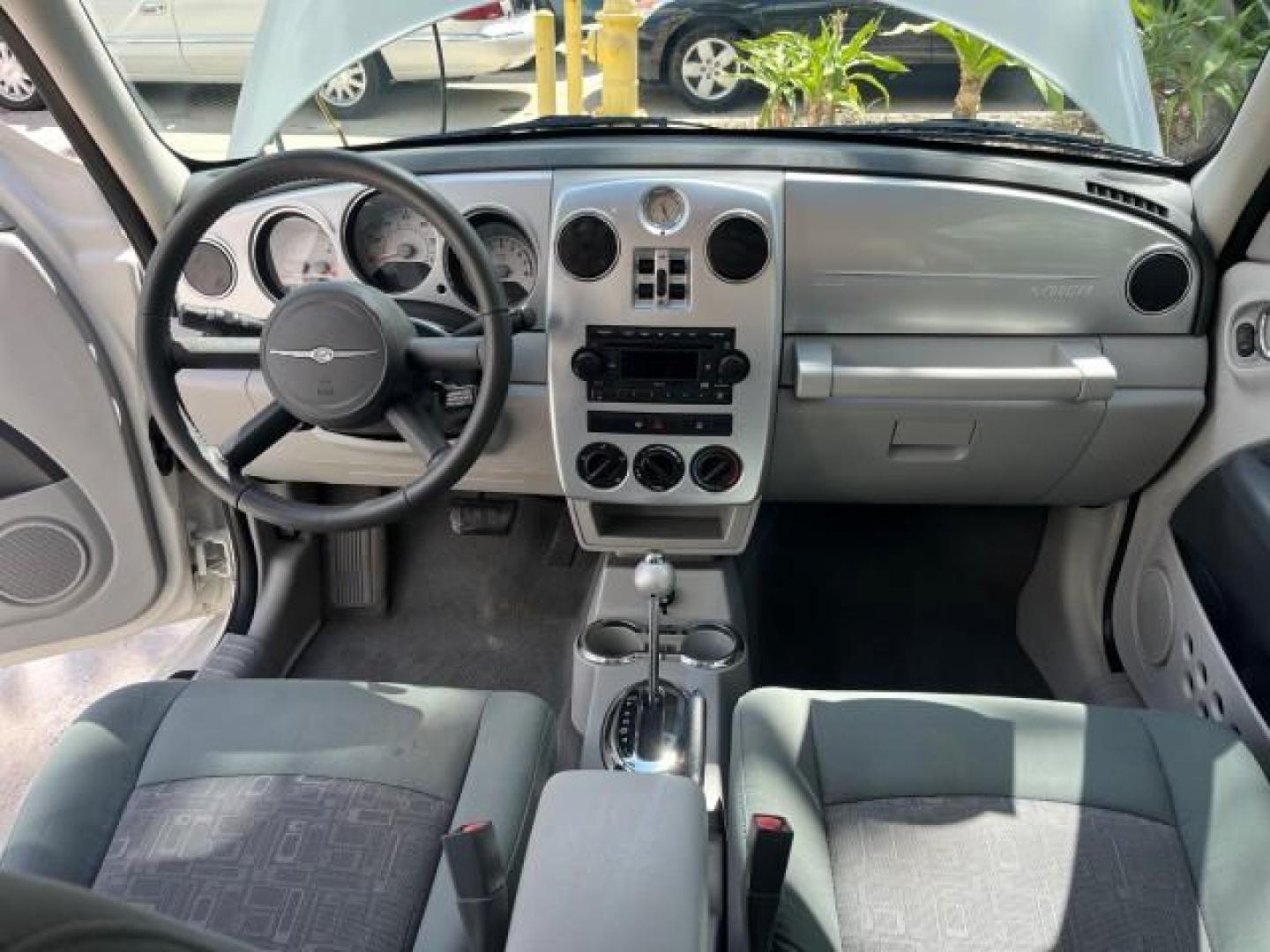 2010 Stone White /Pastel slate gray Chrysler PT Cruiser Classic LOW MILES 31,863 (3A4GY5F95AT) with an 2.4L DOHC SMPI 16-Valve I4 Engine engine, Automatic transmission, located at 4701 North Dixie Hwy, Pompano Beach, FL, 33064, (954) 422-2889, 26.240938, -80.123474 - 2010 CHRYSLER PT CRUISER ROAD READY 2.4L I4 VIN: 3A4GY5F95AT192153 NO ACCIDENTS NO RECALLS VAN FLORIDA OWNER 2.4L I4 F DOHC 16V 16 SERVICE RECORDS GASOLINE LOW MILES 31,863 FRONT WHEEL DRIVE Additional Airbags Alloy Wheels Anti-Theft System Chrome Grille Cruise Control Curtain Airbags Electronic Tra - Photo#33