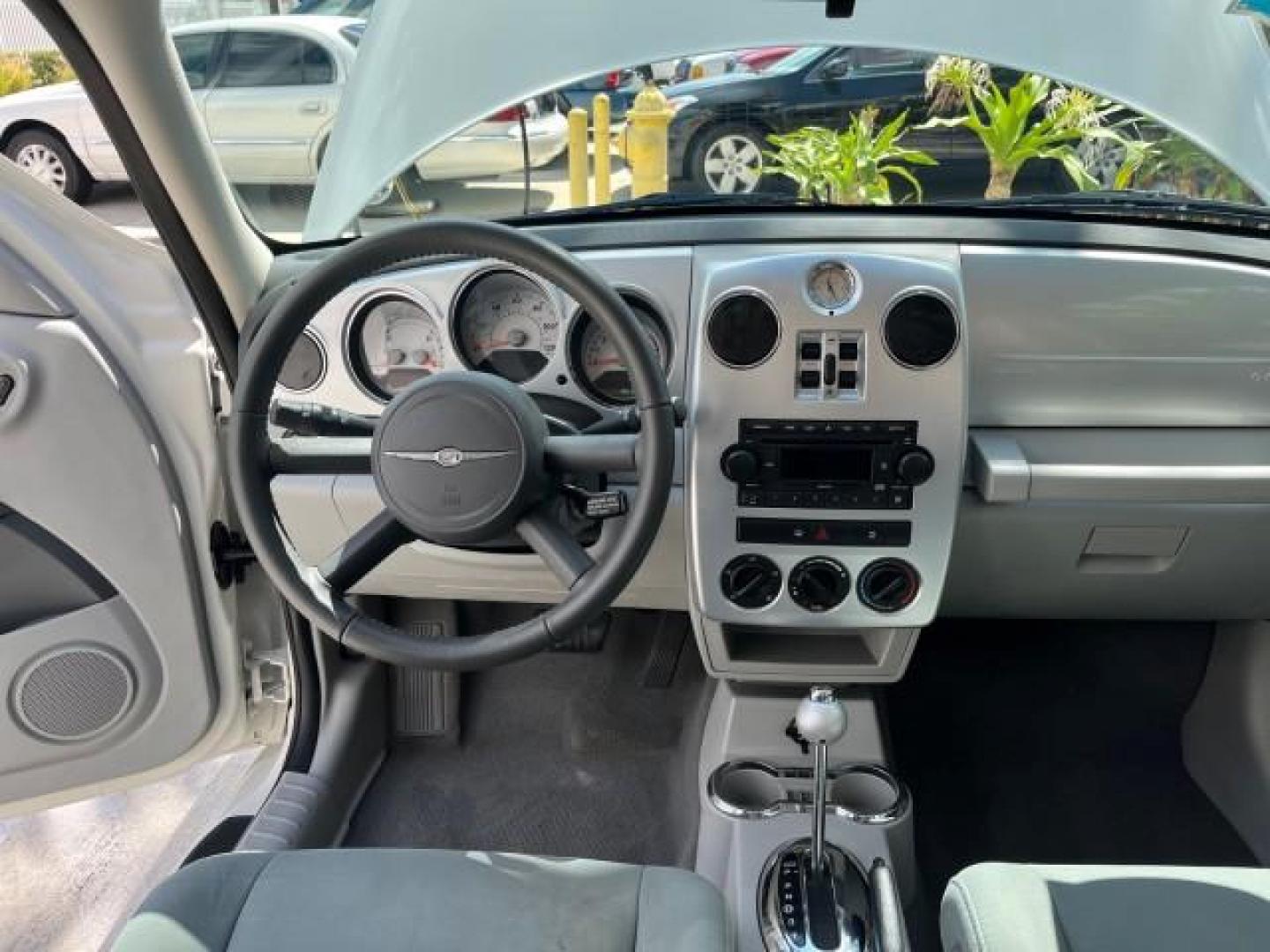 2010 Stone White /Pastel slate gray Chrysler PT Cruiser Classic LOW MILES 31,863 (3A4GY5F95AT) with an 2.4L DOHC SMPI 16-Valve I4 Engine engine, Automatic transmission, located at 4701 North Dixie Hwy, Pompano Beach, FL, 33064, (954) 422-2889, 26.240938, -80.123474 - 2010 CHRYSLER PT CRUISER ROAD READY 2.4L I4 VIN: 3A4GY5F95AT192153 NO ACCIDENTS NO RECALLS VAN FLORIDA OWNER 2.4L I4 F DOHC 16V 16 SERVICE RECORDS GASOLINE LOW MILES 31,863 FRONT WHEEL DRIVE Additional Airbags Alloy Wheels Anti-Theft System Chrome Grille Cruise Control Curtain Airbags Electronic Tra - Photo#35