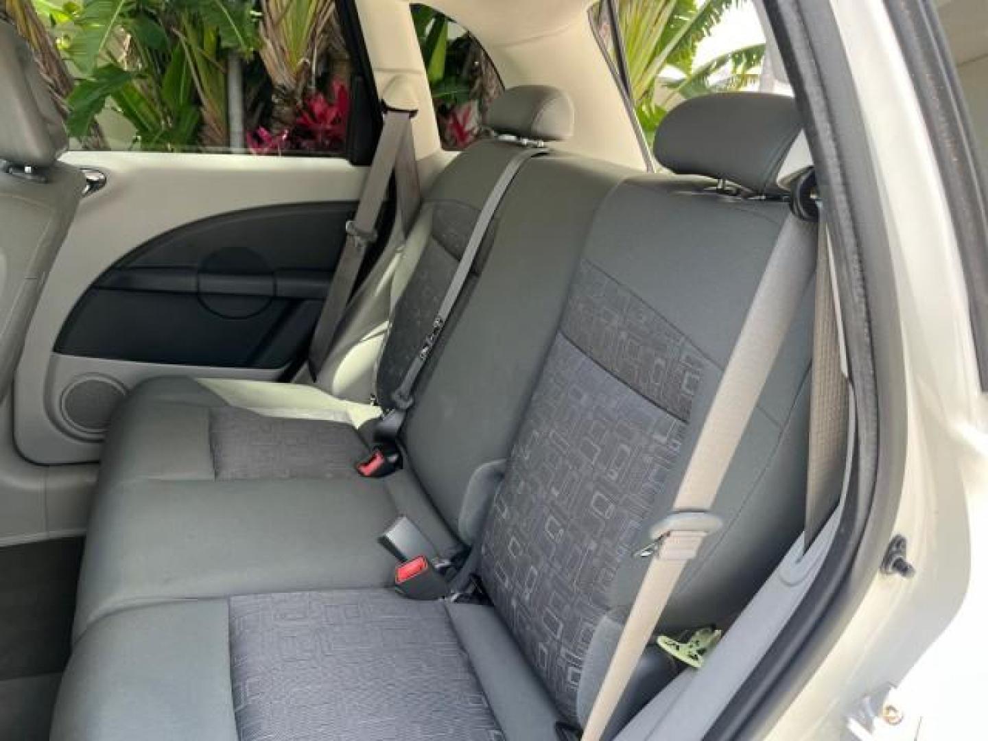 2010 Stone White /Pastel slate gray Chrysler PT Cruiser Classic LOW MILES 31,863 (3A4GY5F95AT) with an 2.4L DOHC SMPI 16-Valve I4 Engine engine, Automatic transmission, located at 4701 North Dixie Hwy, Pompano Beach, FL, 33064, (954) 422-2889, 26.240938, -80.123474 - 2010 CHRYSLER PT CRUISER ROAD READY 2.4L I4 VIN: 3A4GY5F95AT192153 NO ACCIDENTS NO RECALLS VAN FLORIDA OWNER 2.4L I4 F DOHC 16V 16 SERVICE RECORDS GASOLINE LOW MILES 31,863 FRONT WHEEL DRIVE Additional Airbags Alloy Wheels Anti-Theft System Chrome Grille Cruise Control Curtain Airbags Electronic Tra - Photo#39