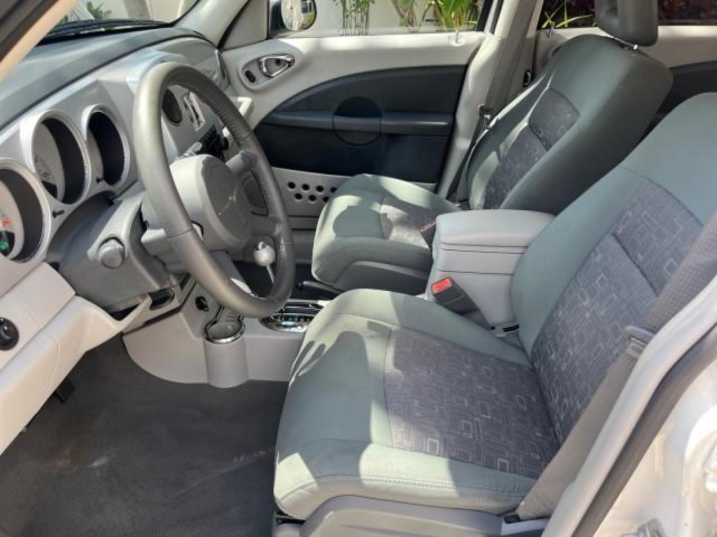 2010 Stone White /Pastel slate gray Chrysler PT Cruiser Classic LOW MILES 31,863 (3A4GY5F95AT) with an 2.4L DOHC SMPI 16-Valve I4 Engine engine, Automatic transmission, located at 4701 North Dixie Hwy, Pompano Beach, FL, 33064, (954) 422-2889, 26.240938, -80.123474 - 2010 CHRYSLER PT CRUISER ROAD READY 2.4L I4 VIN: 3A4GY5F95AT192153 NO ACCIDENTS NO RECALLS VAN FLORIDA OWNER 2.4L I4 F DOHC 16V 16 SERVICE RECORDS GASOLINE LOW MILES 31,863 FRONT WHEEL DRIVE Additional Airbags Alloy Wheels Anti-Theft System Chrome Grille Cruise Control Curtain Airbags Electronic Tra - Photo#41