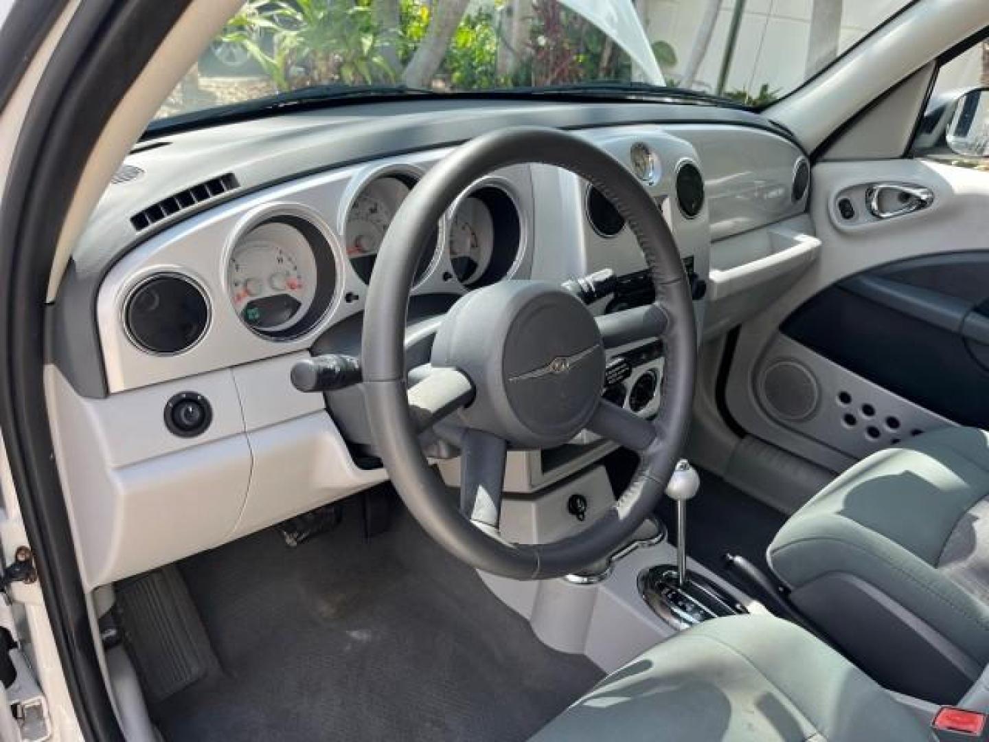 2010 Stone White /Pastel slate gray Chrysler PT Cruiser Classic LOW MILES 31,863 (3A4GY5F95AT) with an 2.4L DOHC SMPI 16-Valve I4 Engine engine, Automatic transmission, located at 4701 North Dixie Hwy, Pompano Beach, FL, 33064, (954) 422-2889, 26.240938, -80.123474 - 2010 CHRYSLER PT CRUISER ROAD READY 2.4L I4 VIN: 3A4GY5F95AT192153 NO ACCIDENTS NO RECALLS VAN FLORIDA OWNER 2.4L I4 F DOHC 16V 16 SERVICE RECORDS GASOLINE LOW MILES 31,863 FRONT WHEEL DRIVE Additional Airbags Alloy Wheels Anti-Theft System Chrome Grille Cruise Control Curtain Airbags Electronic Tra - Photo#42