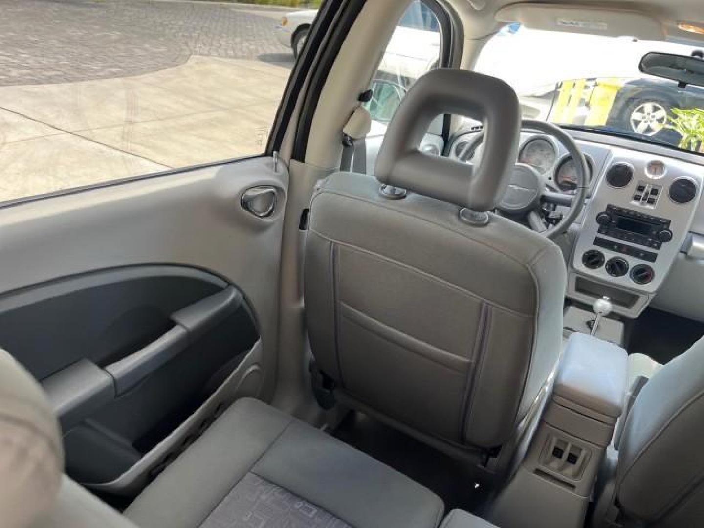 2010 Stone White /Pastel slate gray Chrysler PT Cruiser Classic LOW MILES 31,863 (3A4GY5F95AT) with an 2.4L DOHC SMPI 16-Valve I4 Engine engine, Automatic transmission, located at 4701 North Dixie Hwy, Pompano Beach, FL, 33064, (954) 422-2889, 26.240938, -80.123474 - 2010 CHRYSLER PT CRUISER ROAD READY 2.4L I4 VIN: 3A4GY5F95AT192153 NO ACCIDENTS NO RECALLS VAN FLORIDA OWNER 2.4L I4 F DOHC 16V 16 SERVICE RECORDS GASOLINE LOW MILES 31,863 FRONT WHEEL DRIVE Additional Airbags Alloy Wheels Anti-Theft System Chrome Grille Cruise Control Curtain Airbags Electronic Tra - Photo#65