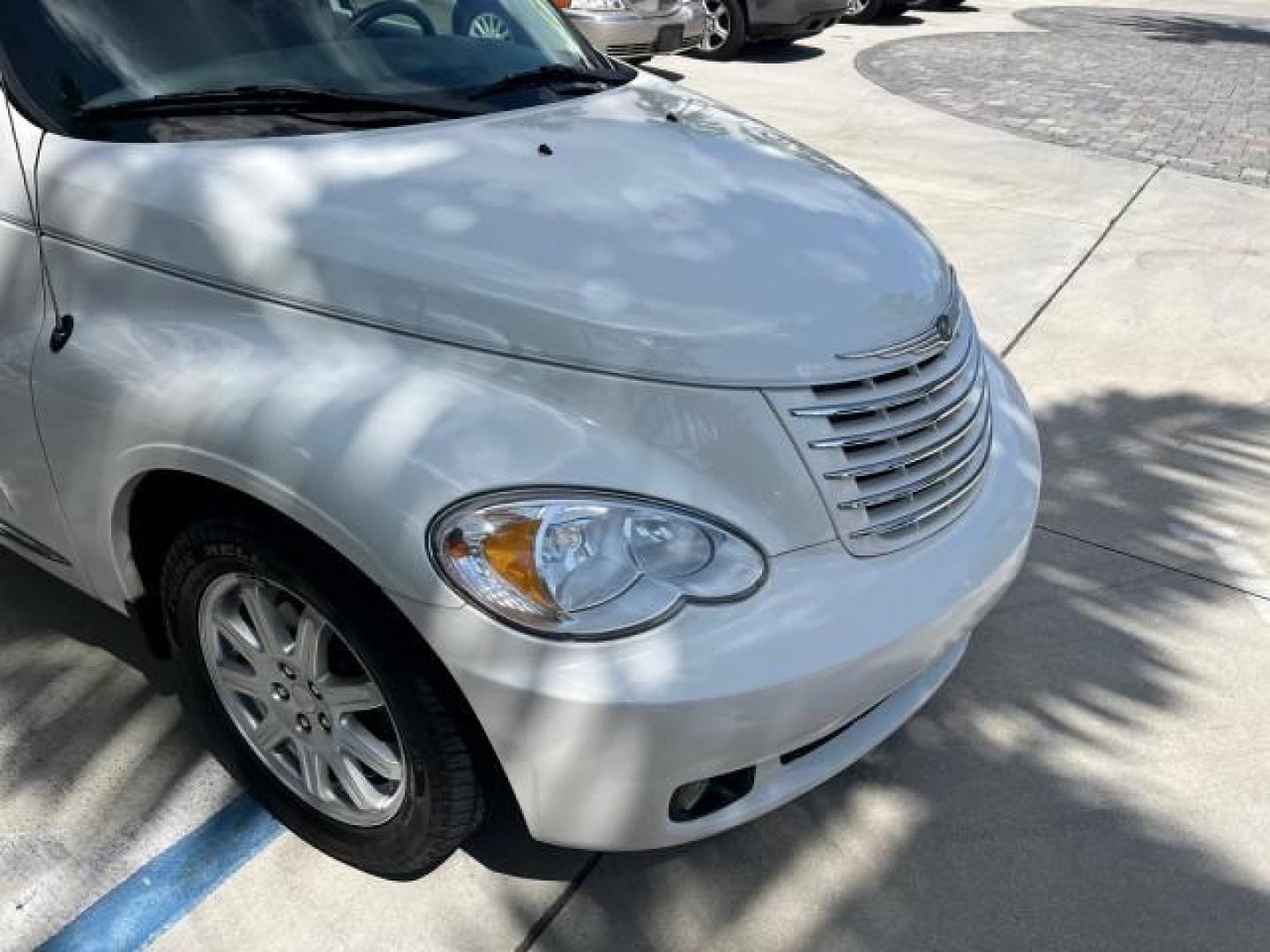 2010 Stone White /Pastel slate gray Chrysler PT Cruiser Classic LOW MILES 31,863 (3A4GY5F95AT) with an 2.4L DOHC SMPI 16-Valve I4 Engine engine, Automatic transmission, located at 4701 North Dixie Hwy, Pompano Beach, FL, 33064, (954) 422-2889, 26.240938, -80.123474 - 2010 CHRYSLER PT CRUISER ROAD READY 2.4L I4 VIN: 3A4GY5F95AT192153 NO ACCIDENTS NO RECALLS VAN FLORIDA OWNER 2.4L I4 F DOHC 16V 16 SERVICE RECORDS GASOLINE LOW MILES 31,863 FRONT WHEEL DRIVE Additional Airbags Alloy Wheels Anti-Theft System Chrome Grille Cruise Control Curtain Airbags Electronic Tra - Photo#82