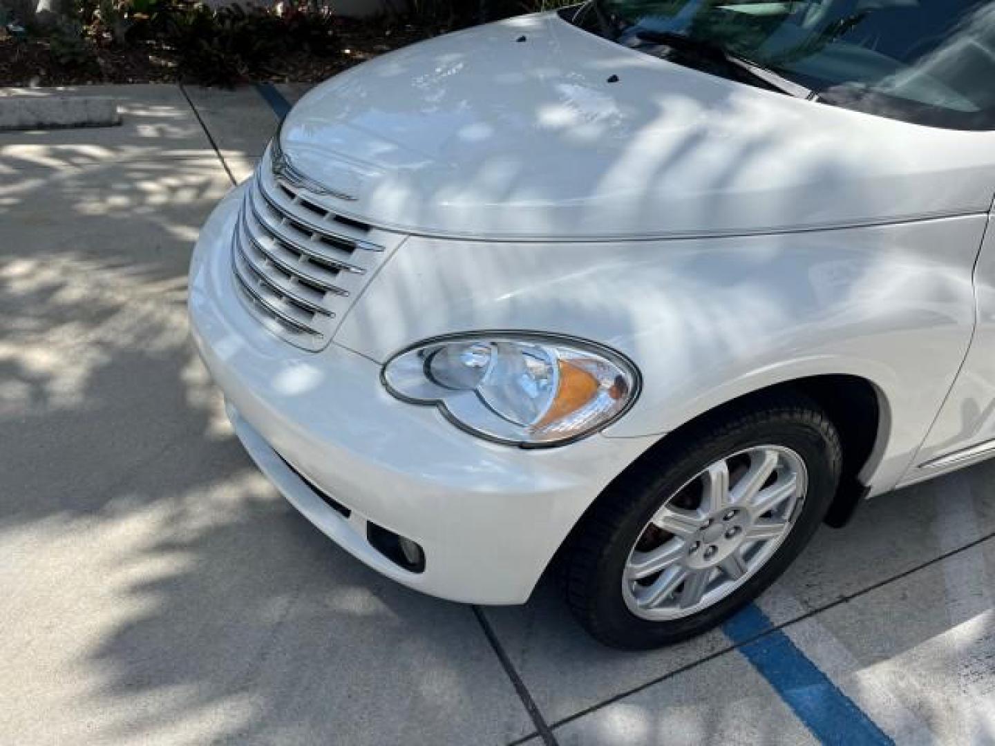 2010 Stone White /Pastel slate gray Chrysler PT Cruiser Classic LOW MILES 31,863 (3A4GY5F95AT) with an 2.4L DOHC SMPI 16-Valve I4 Engine engine, Automatic transmission, located at 4701 North Dixie Hwy, Pompano Beach, FL, 33064, (954) 422-2889, 26.240938, -80.123474 - 2010 CHRYSLER PT CRUISER ROAD READY 2.4L I4 VIN: 3A4GY5F95AT192153 NO ACCIDENTS NO RECALLS VAN FLORIDA OWNER 2.4L I4 F DOHC 16V 16 SERVICE RECORDS GASOLINE LOW MILES 31,863 FRONT WHEEL DRIVE Additional Airbags Alloy Wheels Anti-Theft System Chrome Grille Cruise Control Curtain Airbags Electronic Tra - Photo#83