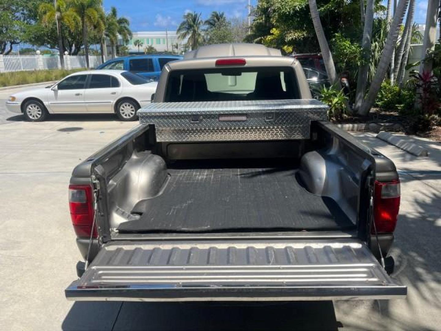 2005 Arizona Beige Metallic /Medium Dk Flint Ford Ranger XL LOW MILES 97,379 (1FTYR10D95P) with an 2.3L DOHC MPFI 16-Valve 4-Cyl Engine engine, Manual transmission, located at 4701 North Dixie Hwy, Pompano Beach, FL, 33064, (954) 422-2889, 26.240938, -80.123474 - 2005 FORD RANGER XL ROAD READY WORK READY VIN: 1FTYR10D95PA84996 NO ACCIDENTS NO RECALLS PICKUP FLORIDA OWNER 2.3L I4 2.3L I4 F LOW MILES 97,379 29 MPG GASOLINE 8 SERVICE RECORDS REAR WHEEL DRIVE 6 FT BED 6.0' Bed Length High-Intensity Headlights RWD Trailer Wiring THIS IS ONE OF THE NICEST RANGERS - Photo#43