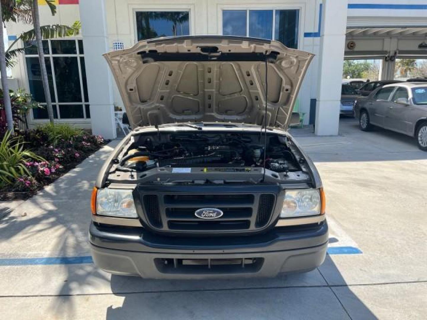 2005 Arizona Beige Metallic /Medium Dk Flint Ford Ranger XL LOW MILES 97,379 (1FTYR10D95P) with an 2.3L DOHC MPFI 16-Valve 4-Cyl Engine engine, Manual transmission, located at 4701 North Dixie Hwy, Pompano Beach, FL, 33064, (954) 422-2889, 26.240938, -80.123474 - 2005 FORD RANGER XL ROAD READY WORK READY VIN: 1FTYR10D95PA84996 NO ACCIDENTS NO RECALLS PICKUP FLORIDA OWNER 2.3L I4 2.3L I4 F LOW MILES 97,379 29 MPG GASOLINE 8 SERVICE RECORDS REAR WHEEL DRIVE 6 FT BED 6.0' Bed Length High-Intensity Headlights RWD Trailer Wiring THIS IS ONE OF THE NICEST RANGERS - Photo#48