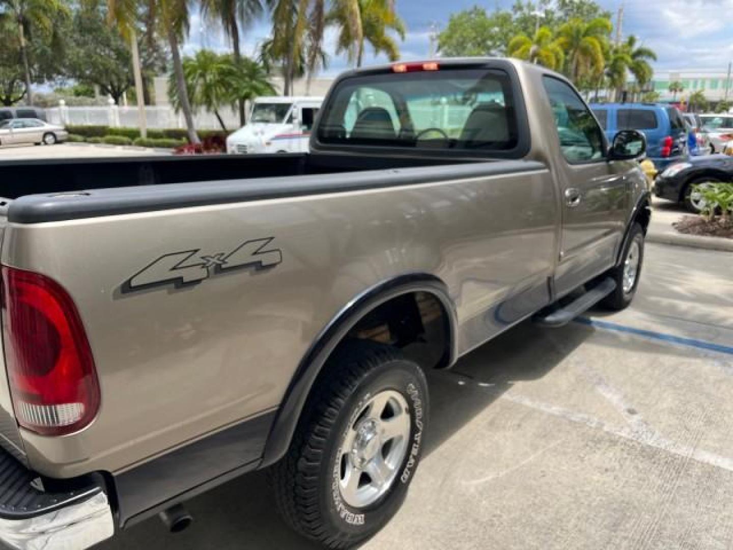 2001 Arizona Beige Metallic /Medium Parchment Ford F-150 4X4 XLT LOW MILES 28,132 (1FTZF18271K) with an 4.2L SEFI V6 Engine engine, Automatic transmission, located at 4701 North Dixie Hwy, Pompano Beach, FL, 33064, (954) 422-2889, 26.240938, -80.123474 - 2001 FORD F-150 XL ROAD READY WORK READY VIN: 1FTZF18271KB45186 NO ACCIDENTS 4.2L V6 PICKUP 4X4 ON DEMAND 4.2L V6 F SOHC SUPER LOW MILES 28,132 GASOLINE 9 SERVICE RECORDS REAR WHEEL DRIVE W/ 4X4 8.1 FT BED 4X4 4WD Anti-Theft System Approach Lights On Demand 4WD THIS IS ONE OF THE NICEST FORD WE HAVE - Photo#86