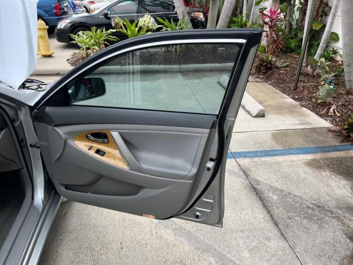 2007 Titanium Metallic /Ash Toyota Camry 1 FL XLE LOW MILES 71,994 (4T1BK46K27U) with an 3.5L DOHC MPFI VVT-i 24-Valve V6 Engine engine, Automatic transmission, located at 4701 North Dixie Hwy, Pompano Beach, FL, 33064, (954) 422-2889, 26.240938, -80.123474 - 2007 TOYOTA CAMRY XLE V6 ROAD READY 3.5L V6 VIN: 4T1BK46K27U024902 XLE LOW MILES 71,994 31MPG SEDAN 4 DR BLUETOOTH 1 OWNER FLORIDA 3.5L V6 F DOHC 24V PARK SENSORS NO ACCIDENTS NO RECALLS GASOLINE DUAL ZONE AC POWER LEATHER SEATS FRONT WHEEL DRIVE 19 SERVICE RECORDS POWER SUNROOF/MIRRORS Additional A - Photo#11