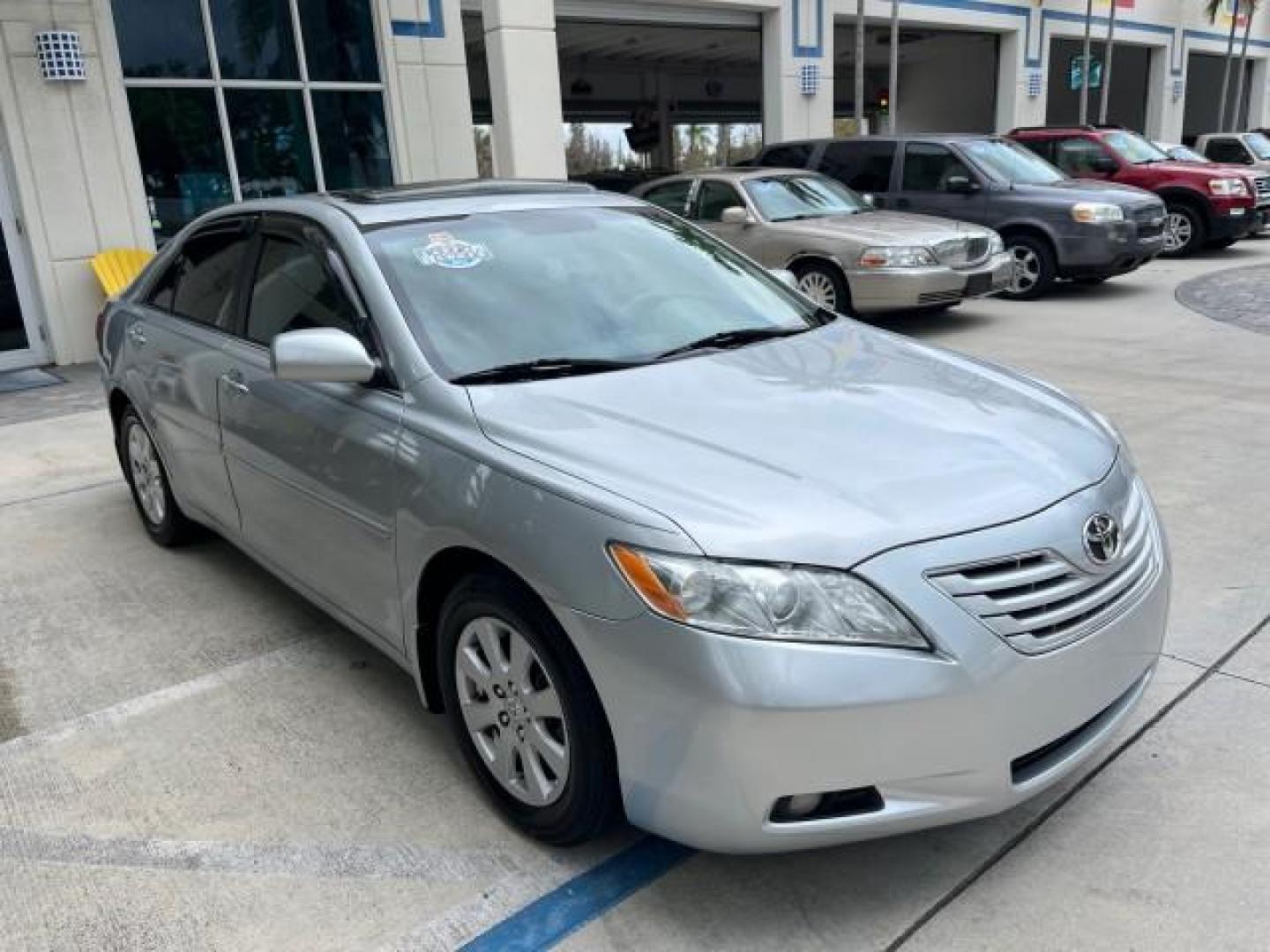 2007 Titanium Metallic /Ash Toyota Camry 1 FL XLE LOW MILES 71,994 (4T1BK46K27U) with an 3.5L DOHC MPFI VVT-i 24-Valve V6 Engine engine, Automatic transmission, located at 4701 North Dixie Hwy, Pompano Beach, FL, 33064, (954) 422-2889, 26.240938, -80.123474 - 2007 TOYOTA CAMRY XLE V6 ROAD READY 3.5L V6 VIN: 4T1BK46K27U024902 XLE LOW MILES 71,994 31MPG SEDAN 4 DR BLUETOOTH 1 OWNER FLORIDA 3.5L V6 F DOHC 24V PARK SENSORS NO ACCIDENTS NO RECALLS GASOLINE DUAL ZONE AC POWER LEATHER SEATS FRONT WHEEL DRIVE 19 SERVICE RECORDS POWER SUNROOF/MIRRORS Additional A - Photo#74