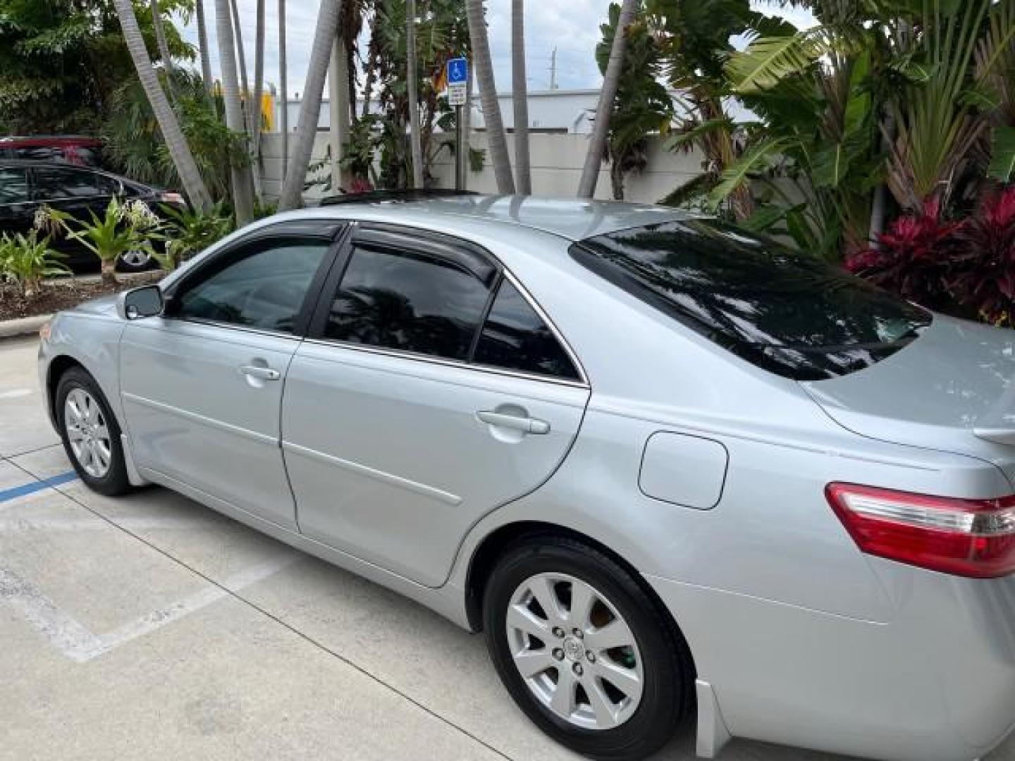 2007 Titanium Metallic /Ash Toyota Camry 1 FL XLE LOW MILES 71,994 (4T1BK46K27U) with an 3.5L DOHC MPFI VVT-i 24-Valve V6 Engine engine, Automatic transmission, located at 4701 North Dixie Hwy, Pompano Beach, FL, 33064, (954) 422-2889, 26.240938, -80.123474 - 2007 TOYOTA CAMRY XLE V6 ROAD READY 3.5L V6 VIN: 4T1BK46K27U024902 XLE LOW MILES 71,994 31MPG SEDAN 4 DR BLUETOOTH 1 OWNER FLORIDA 3.5L V6 F DOHC 24V PARK SENSORS NO ACCIDENTS NO RECALLS GASOLINE DUAL ZONE AC POWER LEATHER SEATS FRONT WHEEL DRIVE 19 SERVICE RECORDS POWER SUNROOF/MIRRORS Additional A - Photo#97