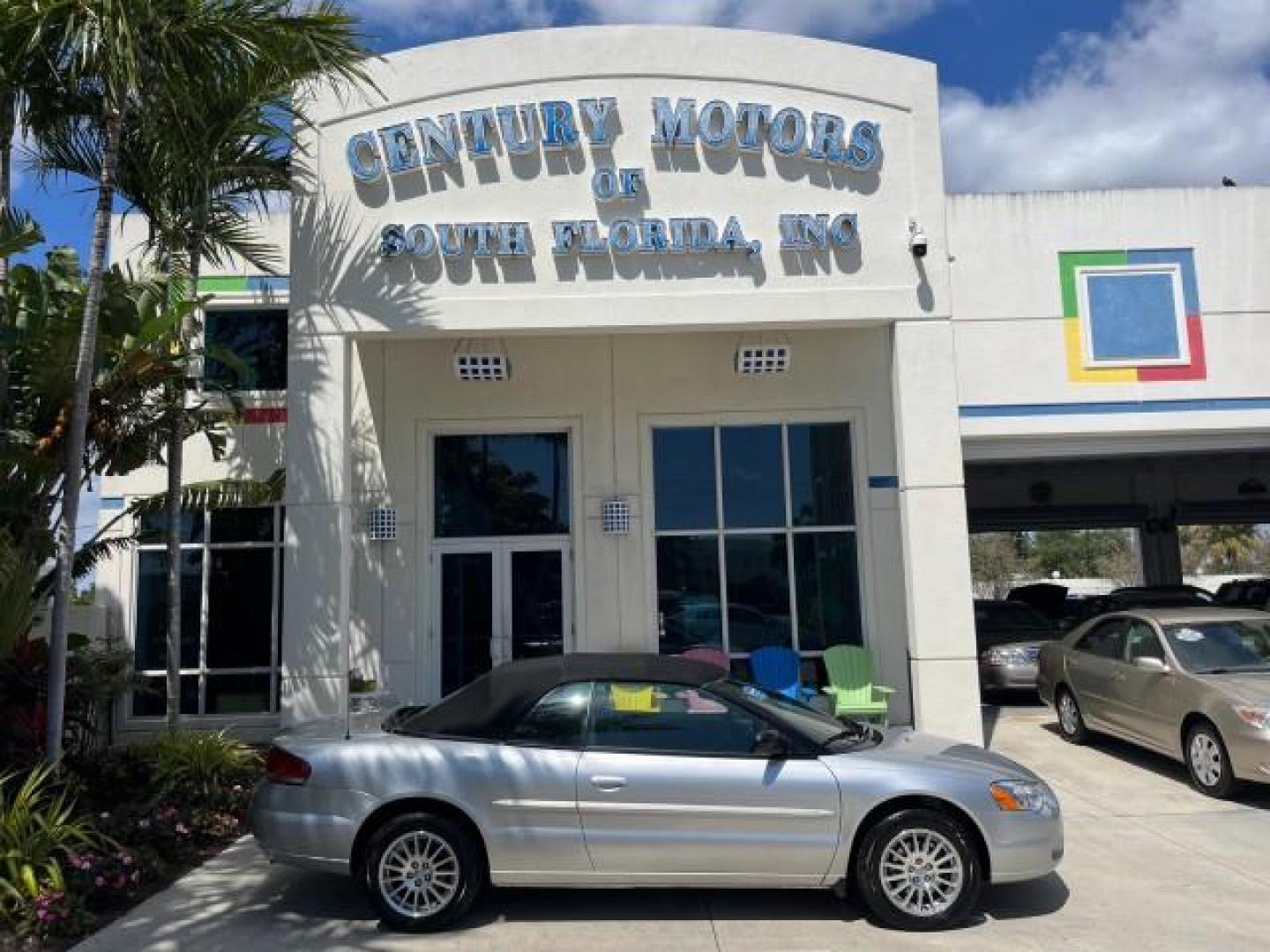 2005 Bright Silver Metallic /Dark Slate Gray Chrysler Sebring Conv Touring LOW MILES 26,922 (1C3EL55R75N) with an 2.7L DOHC SMPI 24-Valve V6 Engine engine, Automatic transmission, located at 4701 North Dixie Hwy, Pompano Beach, FL, 33064, (954) 422-2889, 26.240938, -80.123474 - OUR WEBPAGE FLORIDACARS1.COM HAS OVER 100 PHOTOS AND FREE CARFAX LINK 2005 CHRYSLER SEBRING TOURING ROAD READY 2.7L V6 VIN: 1C3EL55R75N653067 NO ACCIDENTS NO RECALLS CONVERTIBLE FLORIDA OWNER 28 MPG 2.7L V6 F DOHC 24V SUPER LOW MILES 26,922 GASOLINE POWER CONVERTIBLE TOP FRONT WHEEL DRIVE 7 SERVICE - Photo#0