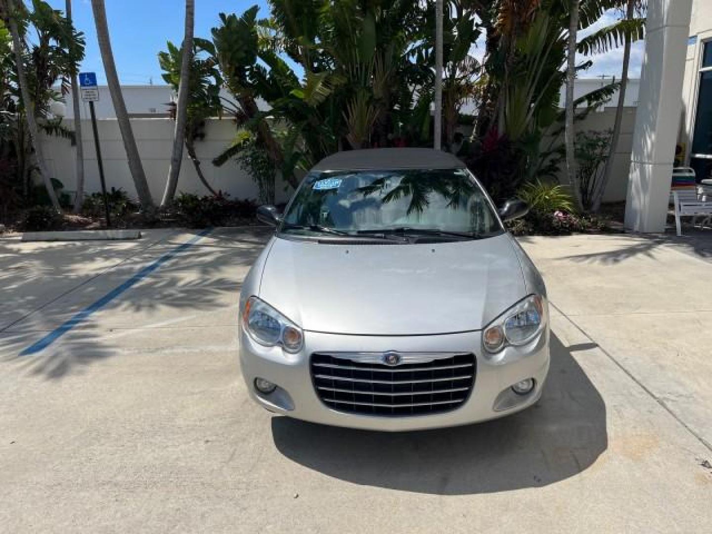 2005 Bright Silver Metallic /Dark Slate Gray Chrysler Sebring Conv Touring LOW MILES 26,922 (1C3EL55R75N) with an 2.7L DOHC SMPI 24-Valve V6 Engine engine, Automatic transmission, located at 4701 North Dixie Hwy, Pompano Beach, FL, 33064, (954) 422-2889, 26.240938, -80.123474 - OUR WEBPAGE FLORIDACARS1.COM HAS OVER 100 PHOTOS AND FREE CARFAX LINK 2005 CHRYSLER SEBRING TOURING ROAD READY 2.7L V6 VIN: 1C3EL55R75N653067 NO ACCIDENTS NO RECALLS CONVERTIBLE FLORIDA OWNER 28 MPG 2.7L V6 F DOHC 24V SUPER LOW MILES 26,922 GASOLINE POWER CONVERTIBLE TOP FRONT WHEEL DRIVE 7 SERVICE - Photo#2