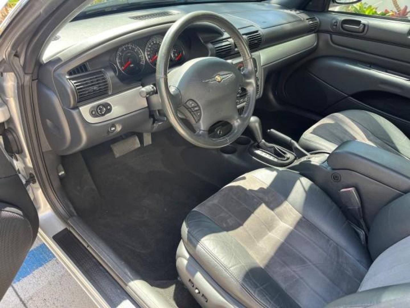 2005 Bright Silver Metallic /Dark Slate Gray Chrysler Sebring Conv Touring LOW MILES 26,922 (1C3EL55R75N) with an 2.7L DOHC SMPI 24-Valve V6 Engine engine, Automatic transmission, located at 4701 North Dixie Hwy, Pompano Beach, FL, 33064, (954) 422-2889, 26.240938, -80.123474 - OUR WEBPAGE FLORIDACARS1.COM HAS OVER 100 PHOTOS AND FREE CARFAX LINK 2005 CHRYSLER SEBRING TOURING ROAD READY 2.7L V6 VIN: 1C3EL55R75N653067 NO ACCIDENTS NO RECALLS CONVERTIBLE FLORIDA OWNER 28 MPG 2.7L V6 F DOHC 24V SUPER LOW MILES 26,922 GASOLINE POWER CONVERTIBLE TOP FRONT WHEEL DRIVE 7 SERVICE - Photo#30