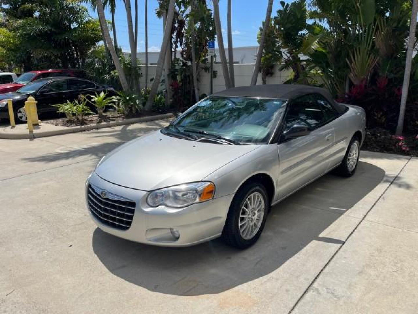 2005 Bright Silver Metallic /Dark Slate Gray Chrysler Sebring Conv Touring LOW MILES 26,922 (1C3EL55R75N) with an 2.7L DOHC SMPI 24-Valve V6 Engine engine, Automatic transmission, located at 4701 North Dixie Hwy, Pompano Beach, FL, 33064, (954) 422-2889, 26.240938, -80.123474 - OUR WEBPAGE FLORIDACARS1.COM HAS OVER 100 PHOTOS AND FREE CARFAX LINK 2005 CHRYSLER SEBRING TOURING ROAD READY 2.7L V6 VIN: 1C3EL55R75N653067 NO ACCIDENTS NO RECALLS CONVERTIBLE FLORIDA OWNER 28 MPG 2.7L V6 F DOHC 24V SUPER LOW MILES 26,922 GASOLINE POWER CONVERTIBLE TOP FRONT WHEEL DRIVE 7 SERVICE - Photo#3