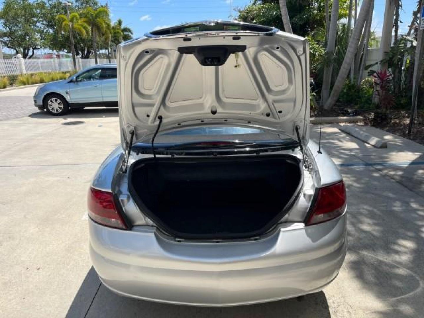 2005 Bright Silver Metallic /Dark Slate Gray Chrysler Sebring Conv Touring LOW MILES 26,922 (1C3EL55R75N) with an 2.7L DOHC SMPI 24-Valve V6 Engine engine, Automatic transmission, located at 4701 North Dixie Hwy, Pompano Beach, FL, 33064, (954) 422-2889, 26.240938, -80.123474 - OUR WEBPAGE FLORIDACARS1.COM HAS OVER 100 PHOTOS AND FREE CARFAX LINK 2005 CHRYSLER SEBRING TOURING ROAD READY 2.7L V6 VIN: 1C3EL55R75N653067 NO ACCIDENTS NO RECALLS CONVERTIBLE FLORIDA OWNER 28 MPG 2.7L V6 F DOHC 24V SUPER LOW MILES 26,922 GASOLINE POWER CONVERTIBLE TOP FRONT WHEEL DRIVE 7 SERVICE - Photo#54