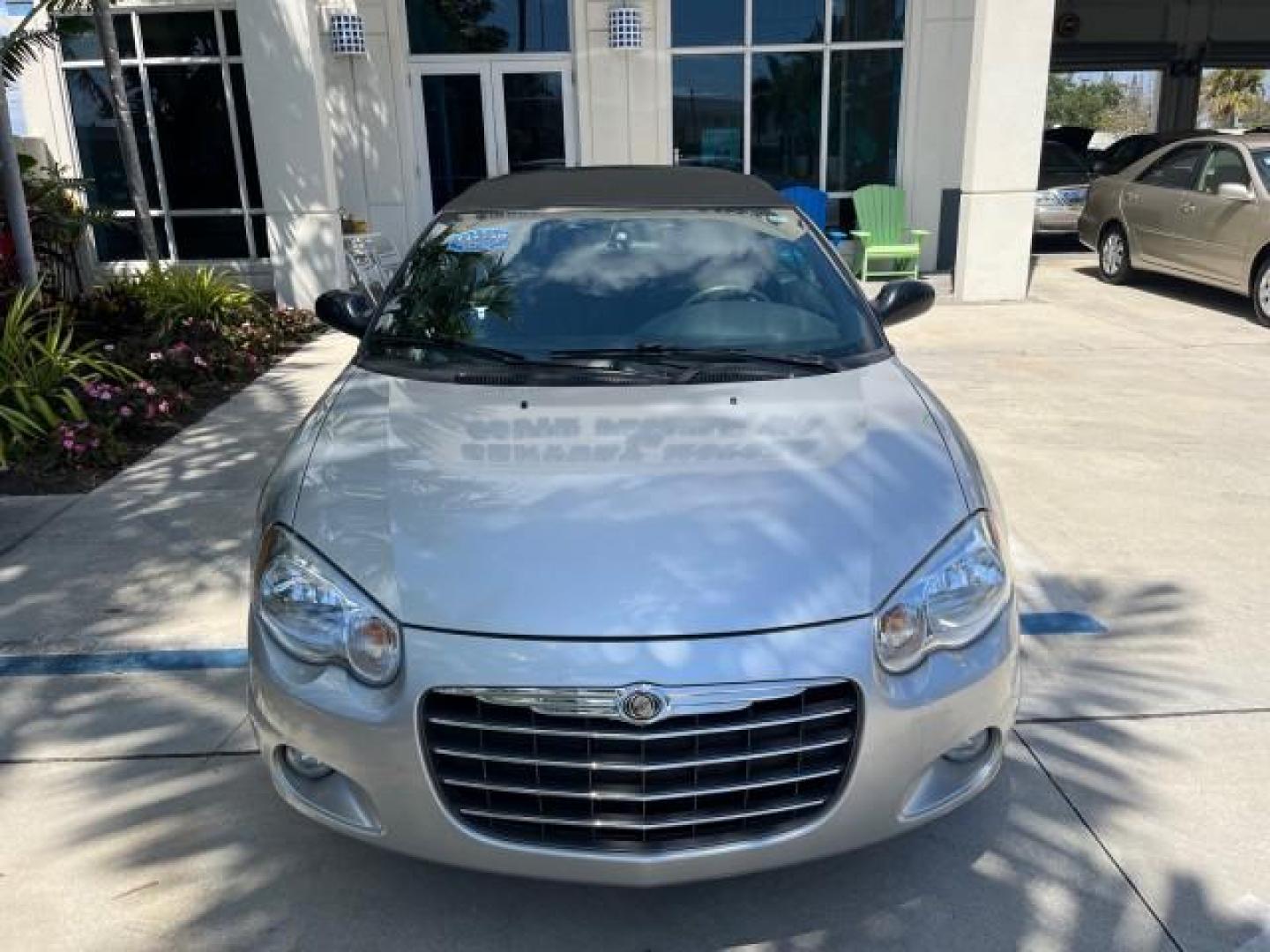 2005 Bright Silver Metallic /Dark Slate Gray Chrysler Sebring Conv Touring LOW MILES 26,922 (1C3EL55R75N) with an 2.7L DOHC SMPI 24-Valve V6 Engine engine, Automatic transmission, located at 4701 North Dixie Hwy, Pompano Beach, FL, 33064, (954) 422-2889, 26.240938, -80.123474 - OUR WEBPAGE FLORIDACARS1.COM HAS OVER 100 PHOTOS AND FREE CARFAX LINK 2005 CHRYSLER SEBRING TOURING ROAD READY 2.7L V6 VIN: 1C3EL55R75N653067 NO ACCIDENTS NO RECALLS CONVERTIBLE FLORIDA OWNER 28 MPG 2.7L V6 F DOHC 24V SUPER LOW MILES 26,922 GASOLINE POWER CONVERTIBLE TOP FRONT WHEEL DRIVE 7 SERVICE - Photo#62