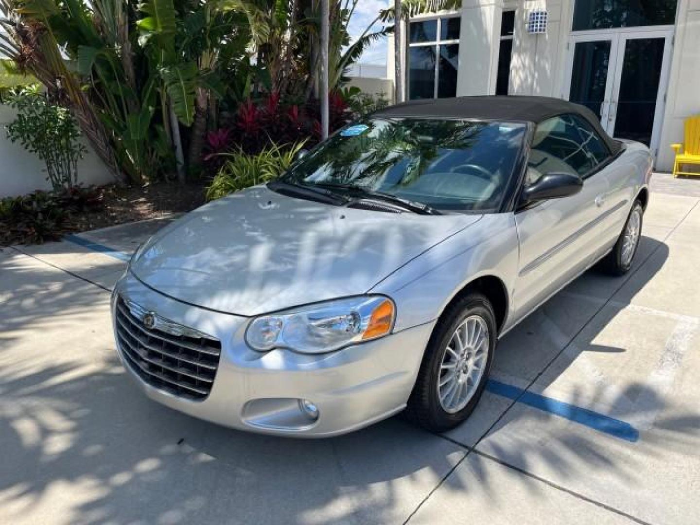 2005 Bright Silver Metallic /Dark Slate Gray Chrysler Sebring Conv Touring LOW MILES 26,922 (1C3EL55R75N) with an 2.7L DOHC SMPI 24-Valve V6 Engine engine, Automatic transmission, located at 4701 North Dixie Hwy, Pompano Beach, FL, 33064, (954) 422-2889, 26.240938, -80.123474 - OUR WEBPAGE FLORIDACARS1.COM HAS OVER 100 PHOTOS AND FREE CARFAX LINK 2005 CHRYSLER SEBRING TOURING ROAD READY 2.7L V6 VIN: 1C3EL55R75N653067 NO ACCIDENTS NO RECALLS CONVERTIBLE FLORIDA OWNER 28 MPG 2.7L V6 F DOHC 24V SUPER LOW MILES 26,922 GASOLINE POWER CONVERTIBLE TOP FRONT WHEEL DRIVE 7 SERVICE - Photo#64