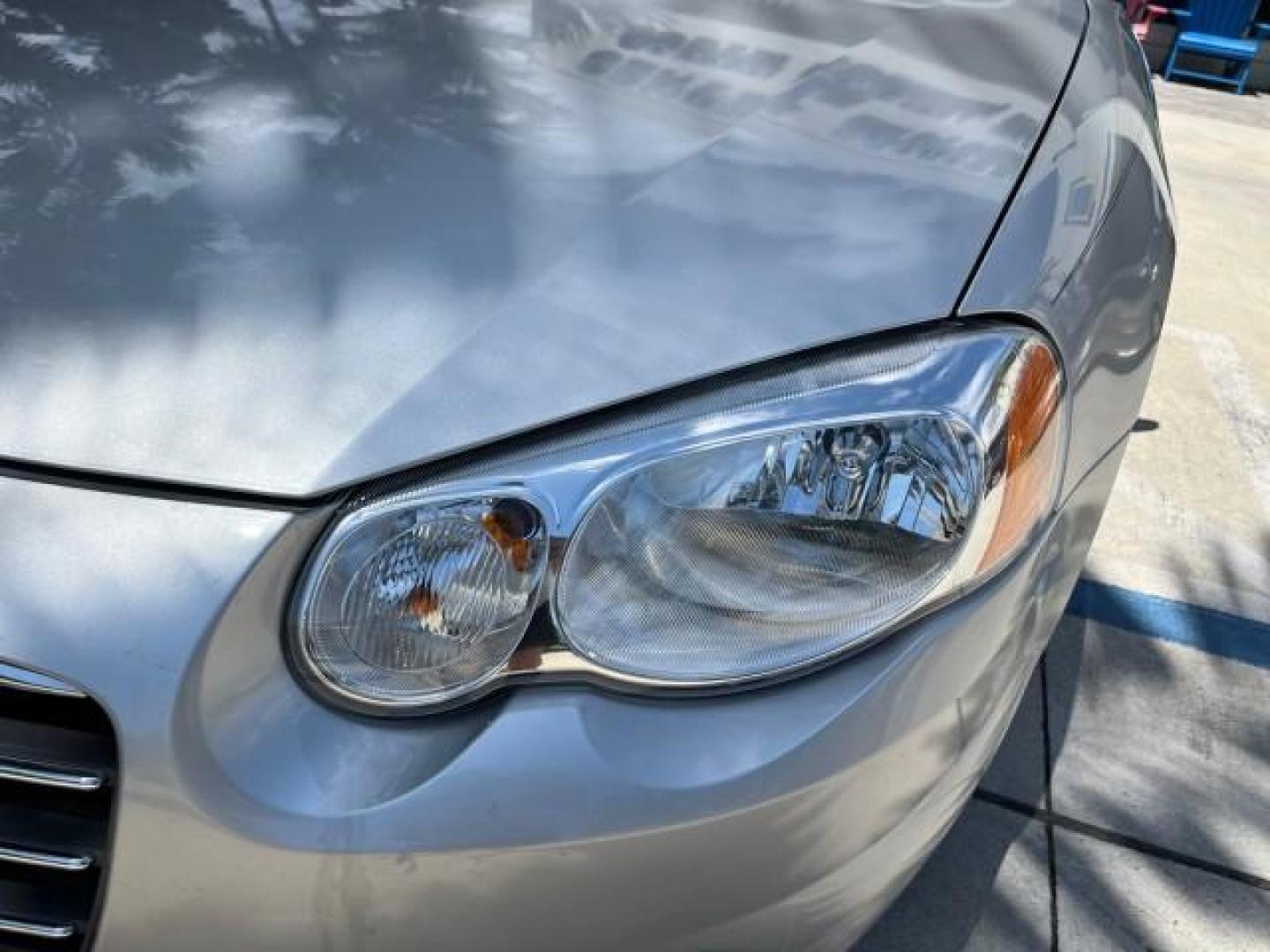 2005 Bright Silver Metallic /Dark Slate Gray Chrysler Sebring Conv Touring LOW MILES 26,922 (1C3EL55R75N) with an 2.7L DOHC SMPI 24-Valve V6 Engine engine, Automatic transmission, located at 4701 North Dixie Hwy, Pompano Beach, FL, 33064, (954) 422-2889, 26.240938, -80.123474 - OUR WEBPAGE FLORIDACARS1.COM HAS OVER 100 PHOTOS AND FREE CARFAX LINK 2005 CHRYSLER SEBRING TOURING ROAD READY 2.7L V6 VIN: 1C3EL55R75N653067 NO ACCIDENTS NO RECALLS CONVERTIBLE FLORIDA OWNER 28 MPG 2.7L V6 F DOHC 24V SUPER LOW MILES 26,922 GASOLINE POWER CONVERTIBLE TOP FRONT WHEEL DRIVE 7 SERVICE - Photo#65