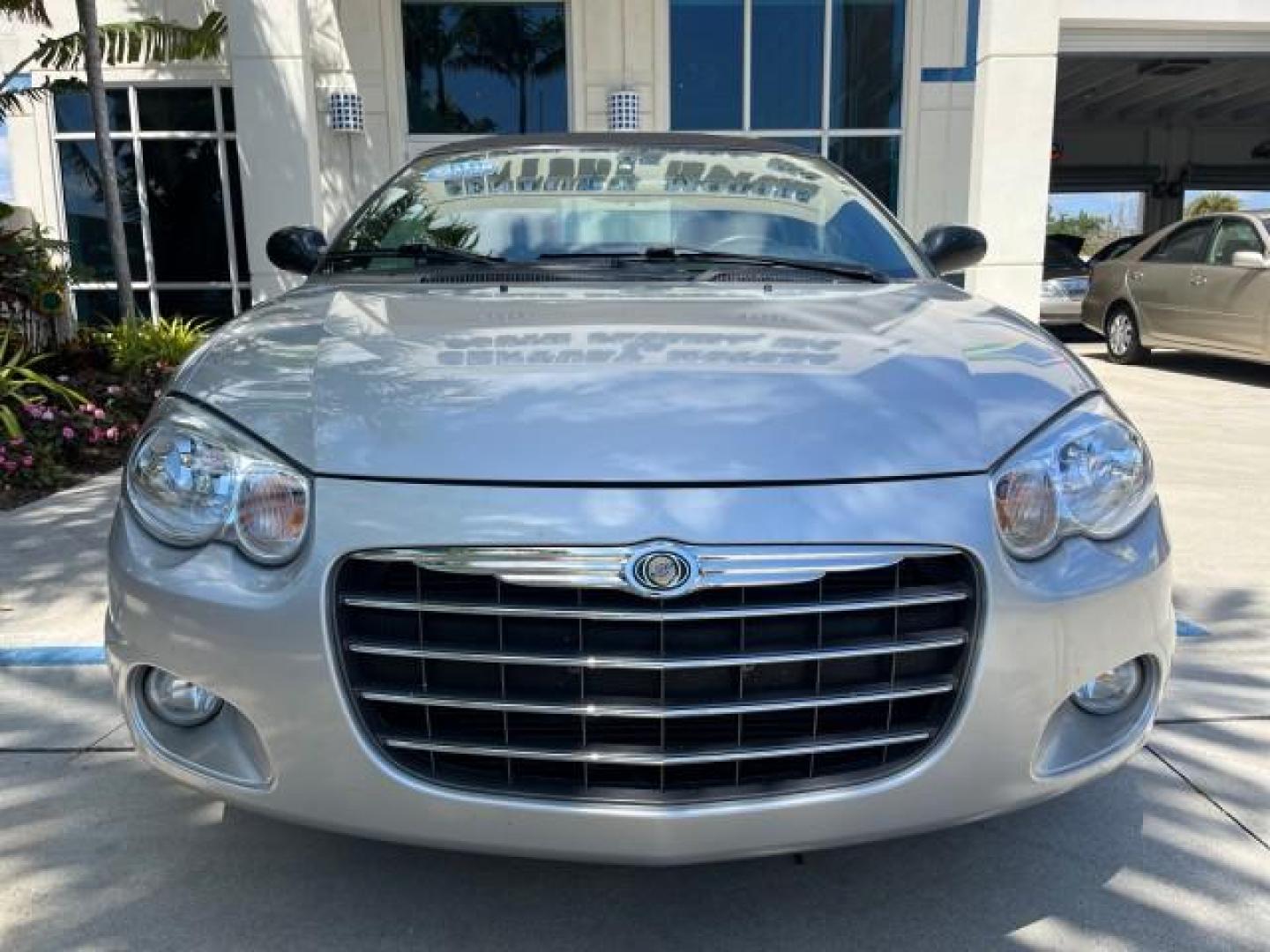 2005 Bright Silver Metallic /Dark Slate Gray Chrysler Sebring Conv Touring LOW MILES 26,922 (1C3EL55R75N) with an 2.7L DOHC SMPI 24-Valve V6 Engine engine, Automatic transmission, located at 4701 North Dixie Hwy, Pompano Beach, FL, 33064, (954) 422-2889, 26.240938, -80.123474 - OUR WEBPAGE FLORIDACARS1.COM HAS OVER 100 PHOTOS AND FREE CARFAX LINK 2005 CHRYSLER SEBRING TOURING ROAD READY 2.7L V6 VIN: 1C3EL55R75N653067 NO ACCIDENTS NO RECALLS CONVERTIBLE FLORIDA OWNER 28 MPG 2.7L V6 F DOHC 24V SUPER LOW MILES 26,922 GASOLINE POWER CONVERTIBLE TOP FRONT WHEEL DRIVE 7 SERVICE - Photo#70