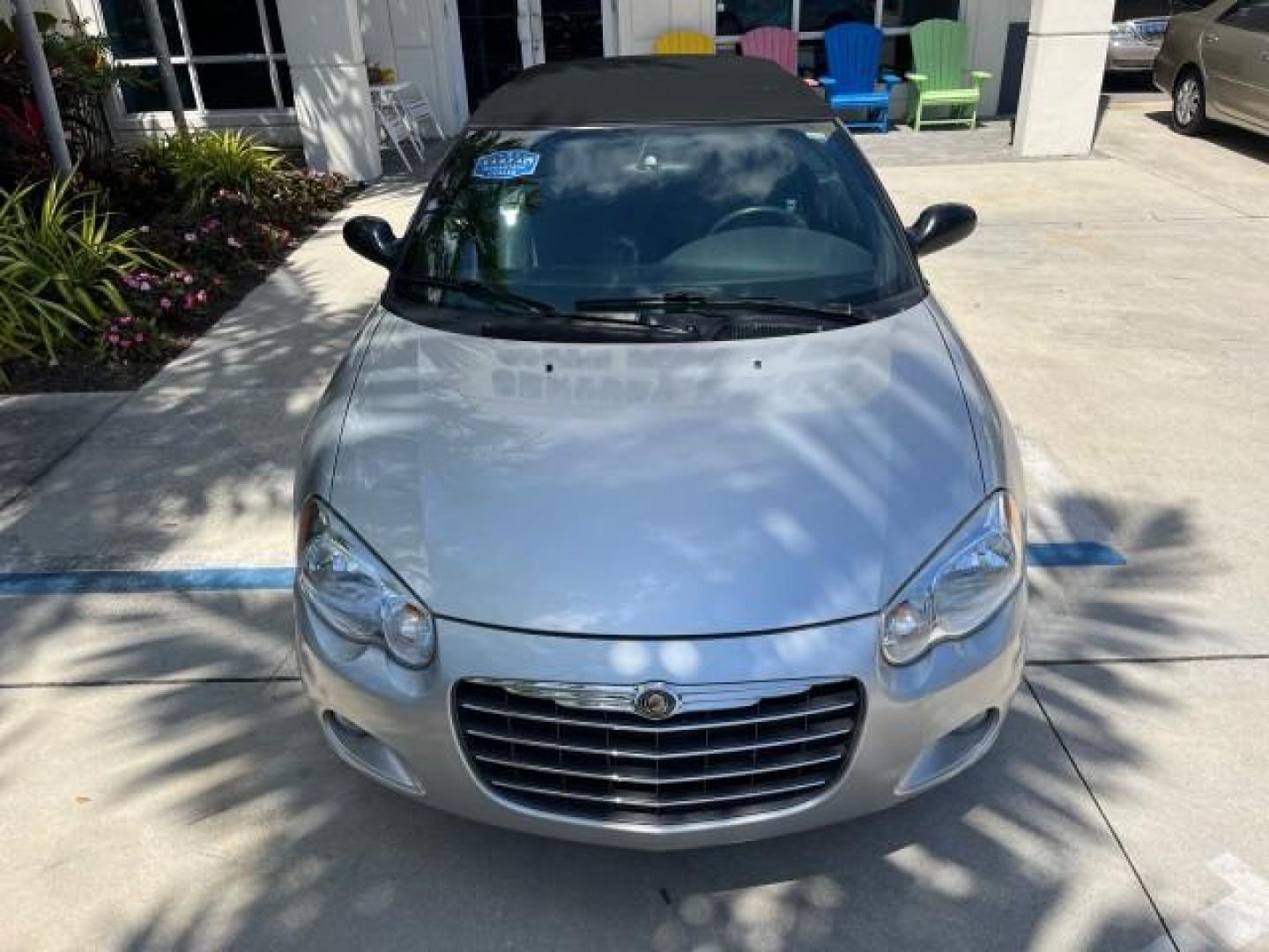 2005 Bright Silver Metallic /Dark Slate Gray Chrysler Sebring Conv Touring LOW MILES 26,922 (1C3EL55R75N) with an 2.7L DOHC SMPI 24-Valve V6 Engine engine, Automatic transmission, located at 4701 North Dixie Hwy, Pompano Beach, FL, 33064, (954) 422-2889, 26.240938, -80.123474 - OUR WEBPAGE FLORIDACARS1.COM HAS OVER 100 PHOTOS AND FREE CARFAX LINK 2005 CHRYSLER SEBRING TOURING ROAD READY 2.7L V6 VIN: 1C3EL55R75N653067 NO ACCIDENTS NO RECALLS CONVERTIBLE FLORIDA OWNER 28 MPG 2.7L V6 F DOHC 24V SUPER LOW MILES 26,922 GASOLINE POWER CONVERTIBLE TOP FRONT WHEEL DRIVE 7 SERVICE - Photo#71