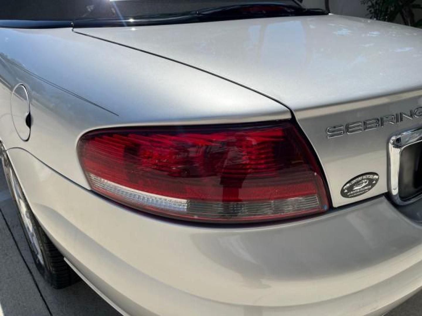 2005 Bright Silver Metallic /Dark Slate Gray Chrysler Sebring Conv Touring LOW MILES 26,922 (1C3EL55R75N) with an 2.7L DOHC SMPI 24-Valve V6 Engine engine, Automatic transmission, located at 4701 North Dixie Hwy, Pompano Beach, FL, 33064, (954) 422-2889, 26.240938, -80.123474 - OUR WEBPAGE FLORIDACARS1.COM HAS OVER 100 PHOTOS AND FREE CARFAX LINK 2005 CHRYSLER SEBRING TOURING ROAD READY 2.7L V6 VIN: 1C3EL55R75N653067 NO ACCIDENTS NO RECALLS CONVERTIBLE FLORIDA OWNER 28 MPG 2.7L V6 F DOHC 24V SUPER LOW MILES 26,922 GASOLINE POWER CONVERTIBLE TOP FRONT WHEEL DRIVE 7 SERVICE - Photo#86