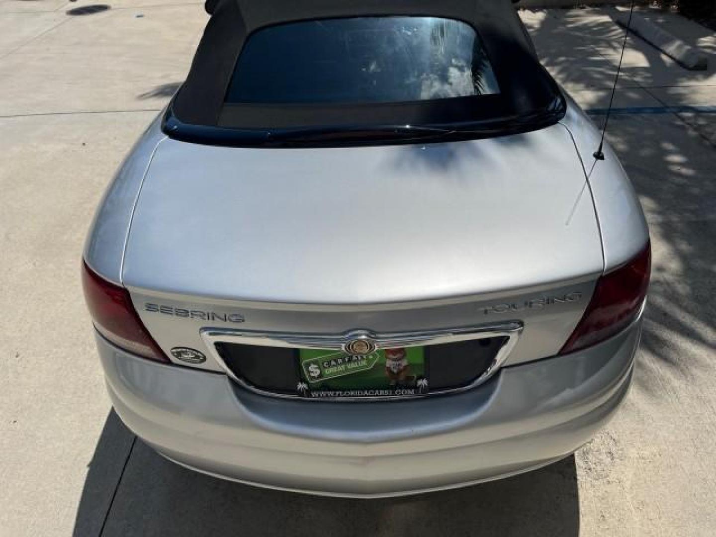 2005 Bright Silver Metallic /Dark Slate Gray Chrysler Sebring Conv Touring LOW MILES 26,922 (1C3EL55R75N) with an 2.7L DOHC SMPI 24-Valve V6 Engine engine, Automatic transmission, located at 4701 North Dixie Hwy, Pompano Beach, FL, 33064, (954) 422-2889, 26.240938, -80.123474 - OUR WEBPAGE FLORIDACARS1.COM HAS OVER 100 PHOTOS AND FREE CARFAX LINK 2005 CHRYSLER SEBRING TOURING ROAD READY 2.7L V6 VIN: 1C3EL55R75N653067 NO ACCIDENTS NO RECALLS CONVERTIBLE FLORIDA OWNER 28 MPG 2.7L V6 F DOHC 24V SUPER LOW MILES 26,922 GASOLINE POWER CONVERTIBLE TOP FRONT WHEEL DRIVE 7 SERVICE - Photo#90