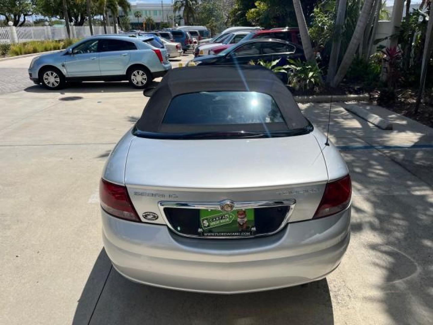 2005 Bright Silver Metallic /Dark Slate Gray Chrysler Sebring Conv Touring LOW MILES 26,922 (1C3EL55R75N) with an 2.7L DOHC SMPI 24-Valve V6 Engine engine, Automatic transmission, located at 4701 North Dixie Hwy, Pompano Beach, FL, 33064, (954) 422-2889, 26.240938, -80.123474 - OUR WEBPAGE FLORIDACARS1.COM HAS OVER 100 PHOTOS AND FREE CARFAX LINK 2005 CHRYSLER SEBRING TOURING ROAD READY 2.7L V6 VIN: 1C3EL55R75N653067 NO ACCIDENTS NO RECALLS CONVERTIBLE FLORIDA OWNER 28 MPG 2.7L V6 F DOHC 24V SUPER LOW MILES 26,922 GASOLINE POWER CONVERTIBLE TOP FRONT WHEEL DRIVE 7 SERVICE - Photo#92