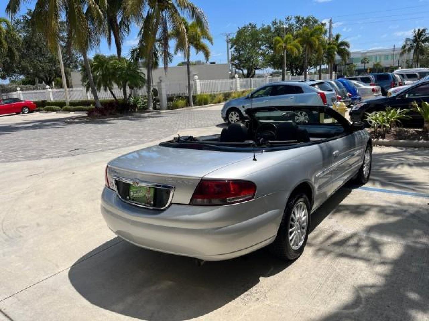 2005 Bright Silver Metallic /Dark Slate Gray Chrysler Sebring Conv Touring LOW MILES 26,922 (1C3EL55R75N) with an 2.7L DOHC SMPI 24-Valve V6 Engine engine, Automatic transmission, located at 4701 North Dixie Hwy, Pompano Beach, FL, 33064, (954) 422-2889, 26.240938, -80.123474 - OUR WEBPAGE FLORIDACARS1.COM HAS OVER 100 PHOTOS AND FREE CARFAX LINK 2005 CHRYSLER SEBRING TOURING ROAD READY 2.7L V6 VIN: 1C3EL55R75N653067 NO ACCIDENTS NO RECALLS CONVERTIBLE FLORIDA OWNER 28 MPG 2.7L V6 F DOHC 24V SUPER LOW MILES 26,922 GASOLINE POWER CONVERTIBLE TOP FRONT WHEEL DRIVE 7 SERVICE - Photo#98