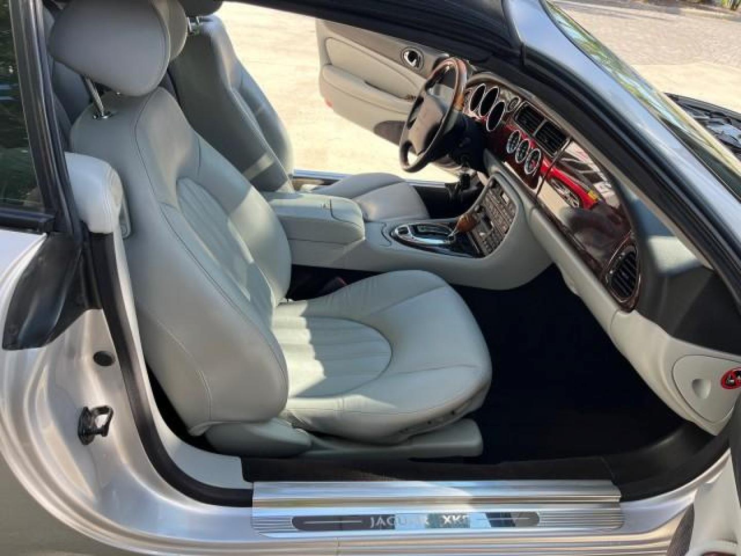 2005 Platinum /Charcoal Jaguar XK8 CONV LOW MILES 22,262 (SAJDA42C852) with an 4.2L DOHC EFI 32-Valve Aluminum Alloy V8 Engine engine, Automatic transmission, located at 4701 North Dixie Hwy, Pompano Beach, FL, 33064, (954) 422-2889, 26.240938, -80.123474 - 2005 JAGUAR XK-SERIES XK8 NEW $76,030 ROAD READY VIN: SAJDA42C852A44308 NO RECALLS 4.2L V8 CONVERTIBLE FLORIDA OWNER 4.2L V8 F DOHC POWER CONVERTIBLE TOP GASOLINE 9 SERVICE RECORDS POWER LEATHER SEATS REAR WHEEL DRIVE SUPER LOW MILES 22,262 PARKING SENSORS Alloy Wheels Anti-Theft System Auto-dimming - Photo#12