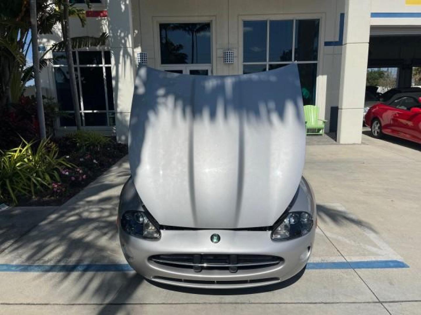 2005 Platinum /Charcoal Jaguar XK8 CONV LOW MILES 22,262 (SAJDA42C852) with an 4.2L DOHC EFI 32-Valve Aluminum Alloy V8 Engine engine, Automatic transmission, located at 4701 North Dixie Hwy, Pompano Beach, FL, 33064, (954) 422-2889, 26.240938, -80.123474 - 2005 JAGUAR XK-SERIES XK8 NEW $76,030 ROAD READY VIN: SAJDA42C852A44308 NO RECALLS 4.2L V8 CONVERTIBLE FLORIDA OWNER 4.2L V8 F DOHC POWER CONVERTIBLE TOP GASOLINE 9 SERVICE RECORDS POWER LEATHER SEATS REAR WHEEL DRIVE SUPER LOW MILES 22,262 PARKING SENSORS Alloy Wheels Anti-Theft System Auto-dimming - Photo#63